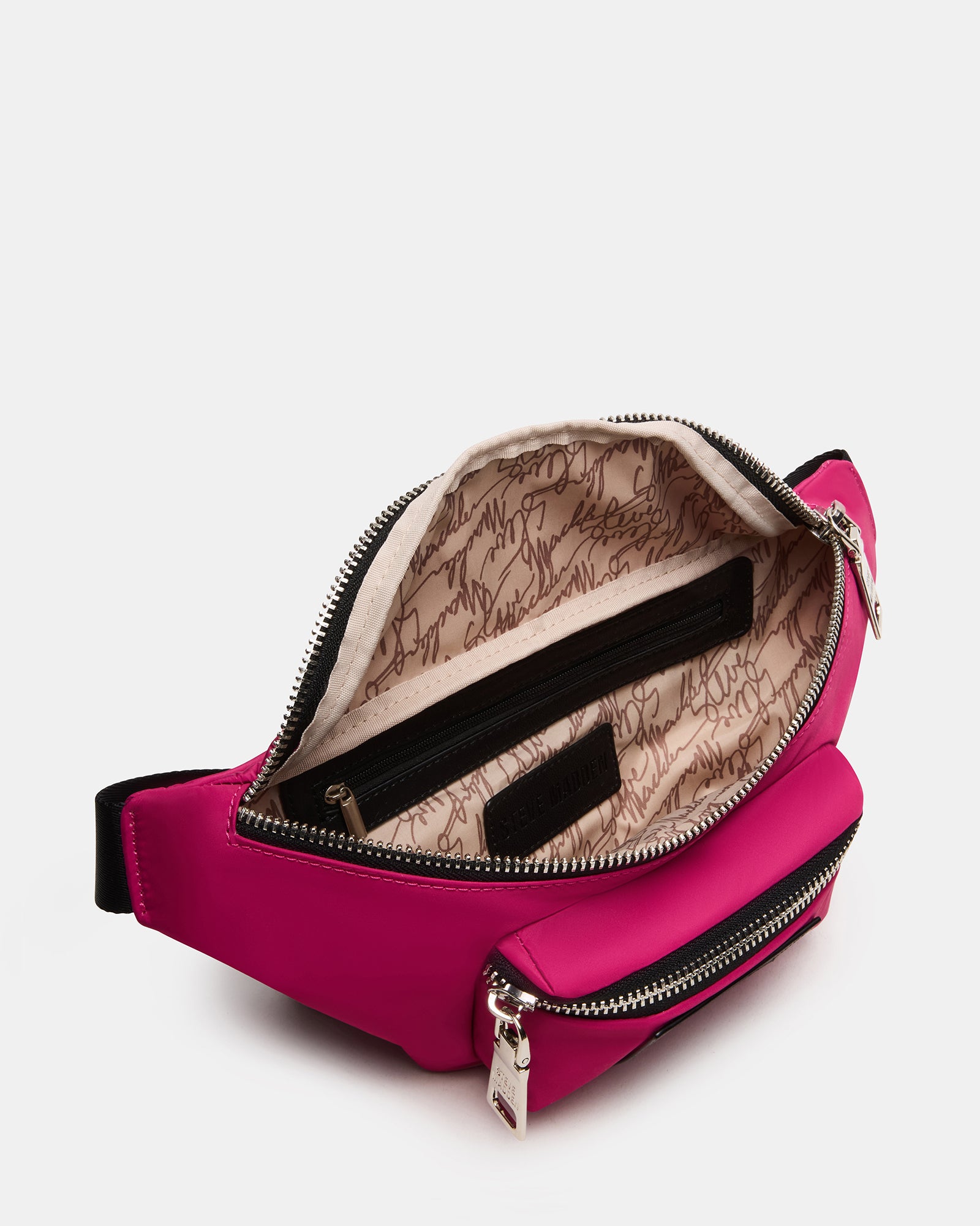 Top angle of remix fanny pack showing oversized zipper pullers and foil logo
