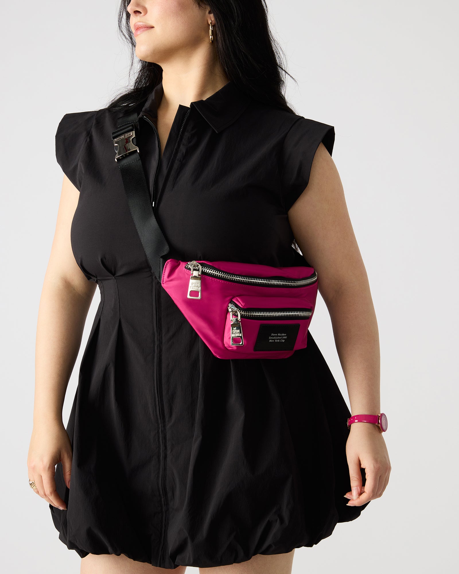 Top angle of remix fanny pack showing oversized zipper pullers and foil logo