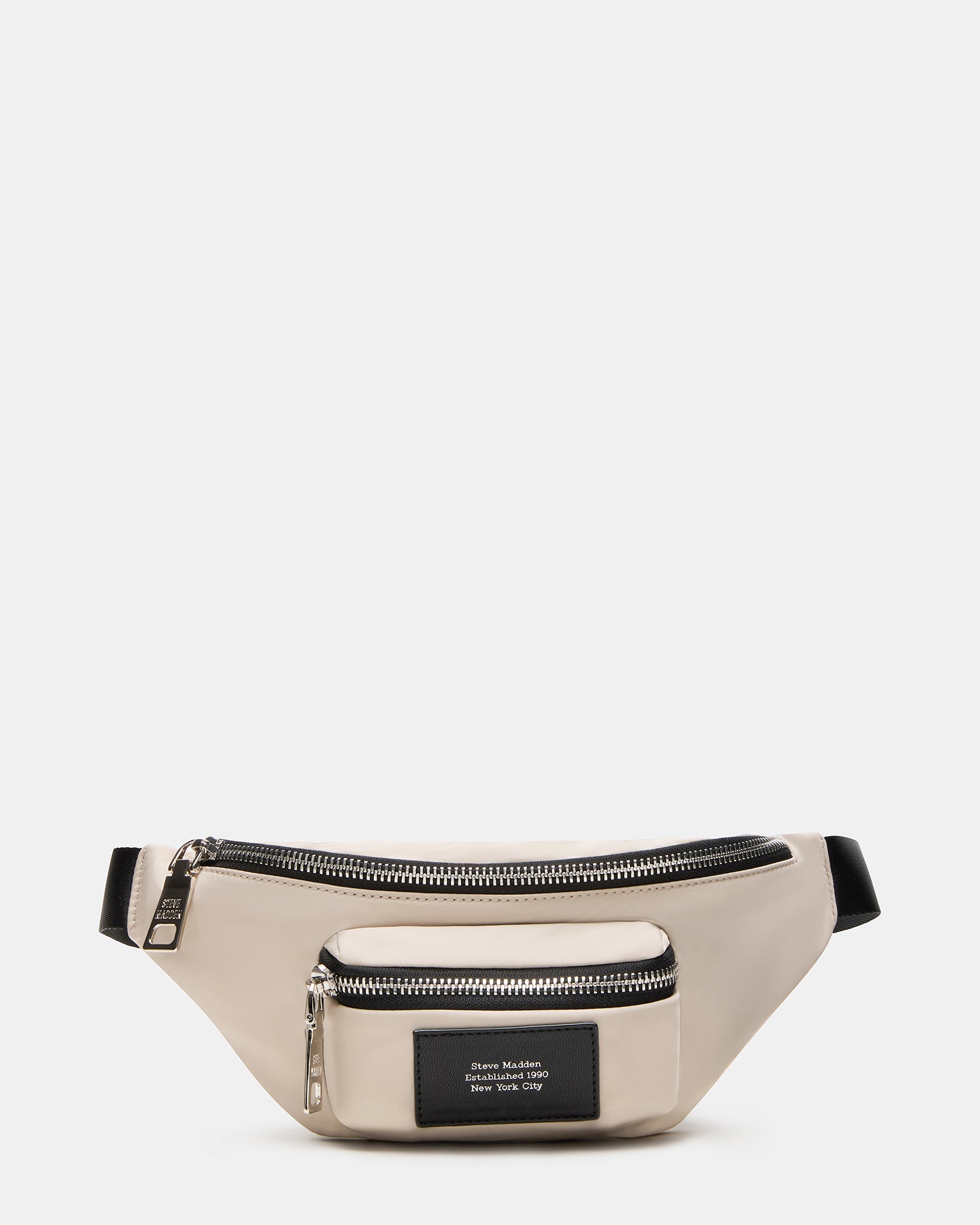 Front view of the crossbody bag worn over the shoulder during a park walk