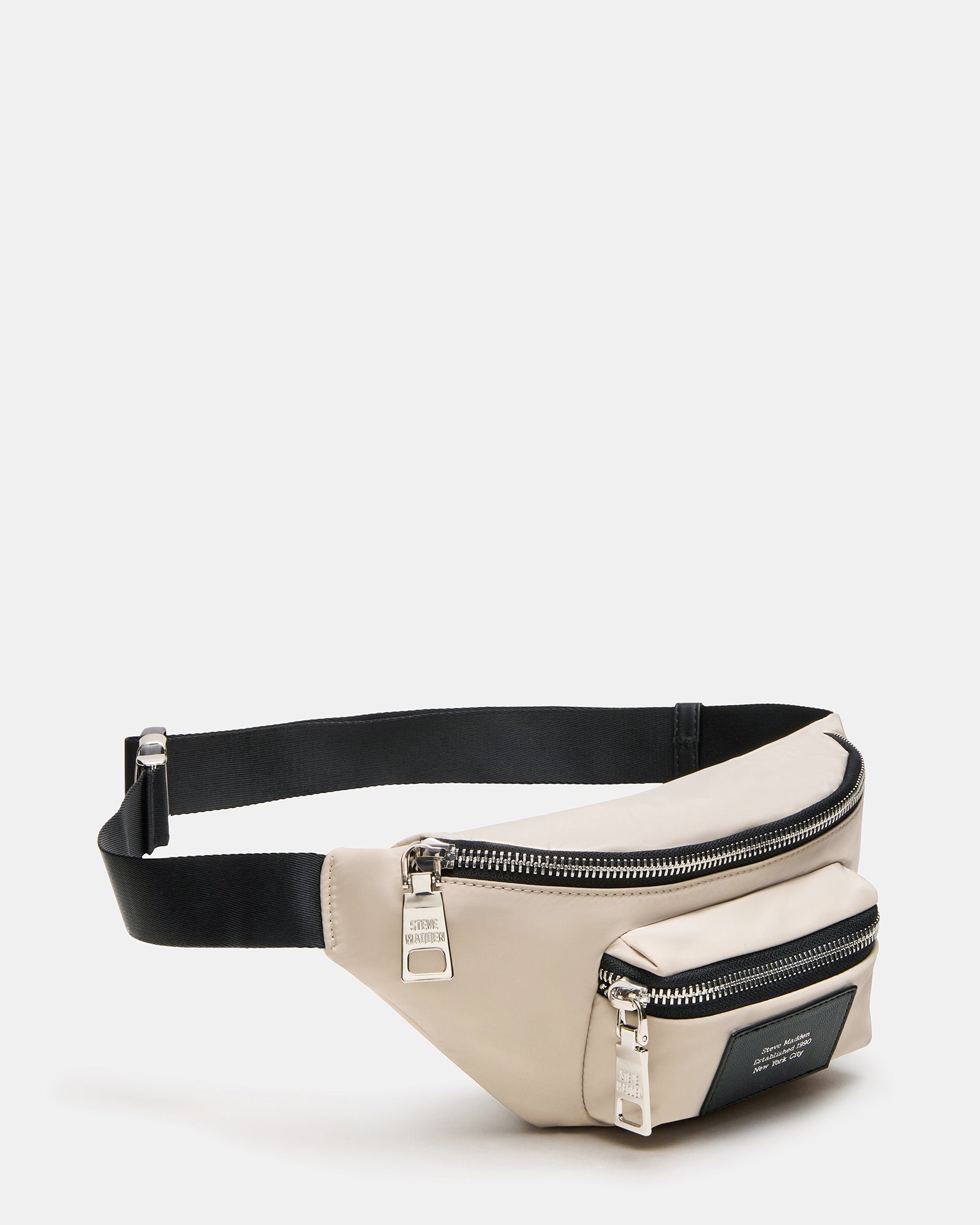 Front view of the crossbody bag worn over the shoulder during a park walk