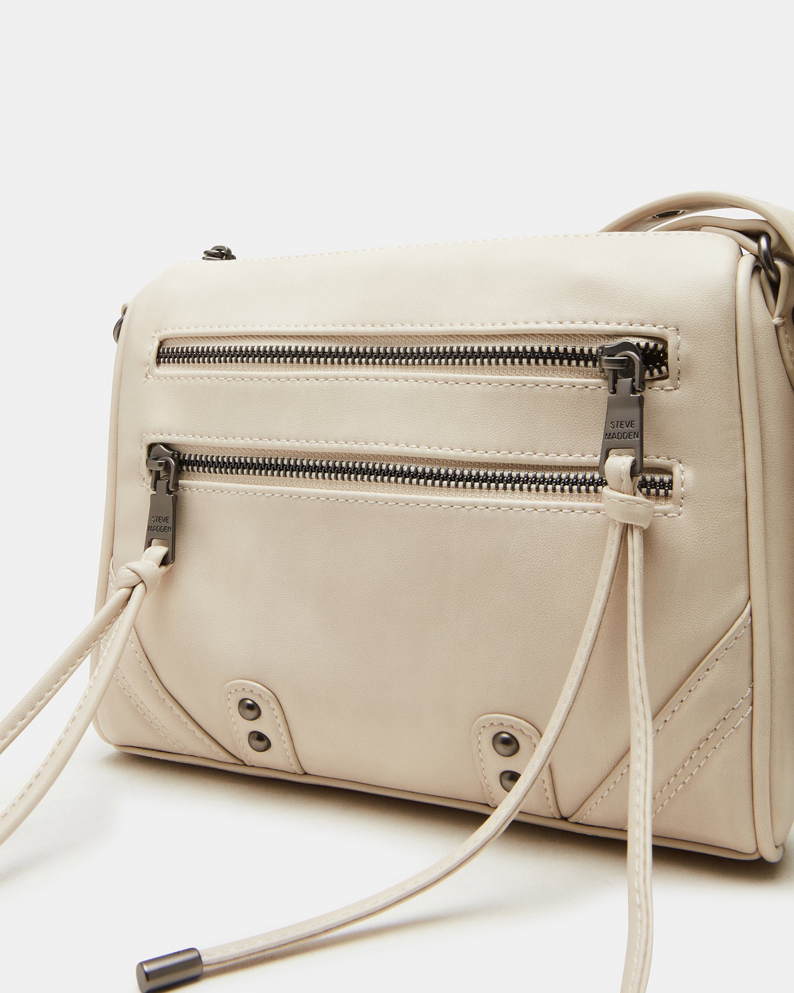 Interior view of the bags zipper pockets and secure buckle straps