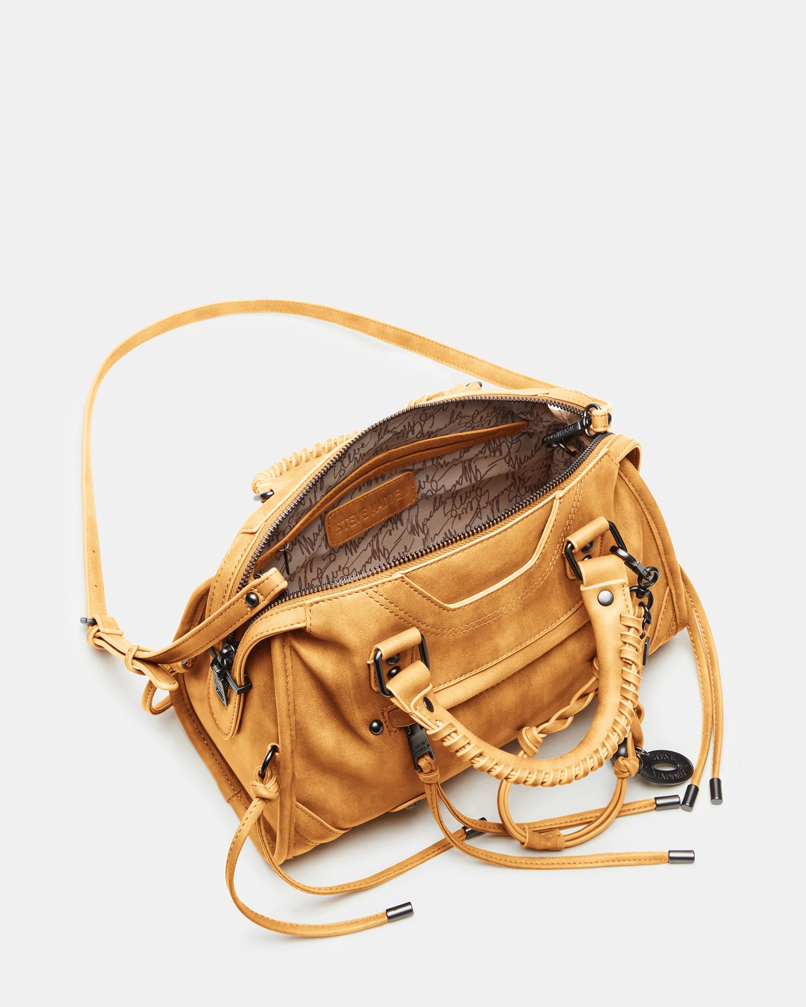 The bags front with slip phone pocket and decorative dome studs