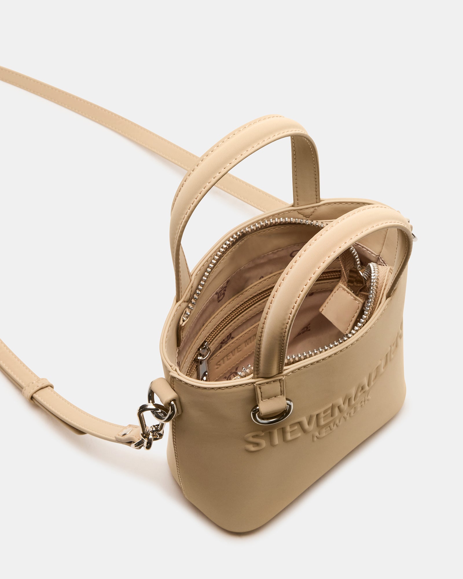 Top-zip view showing compartments in multifunctional bag