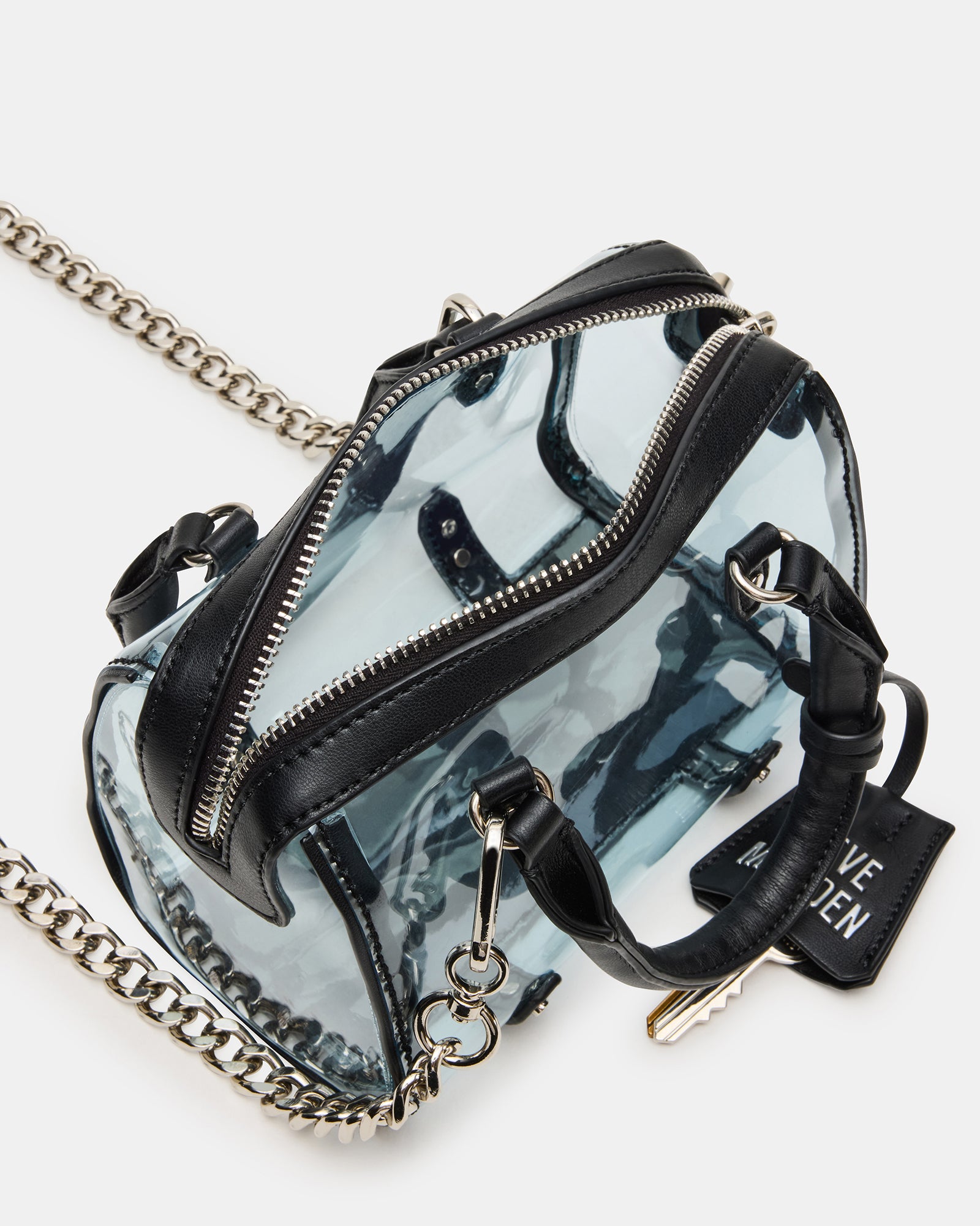Person wearing the RIVAL mini clear crossbody bag at a stadium event