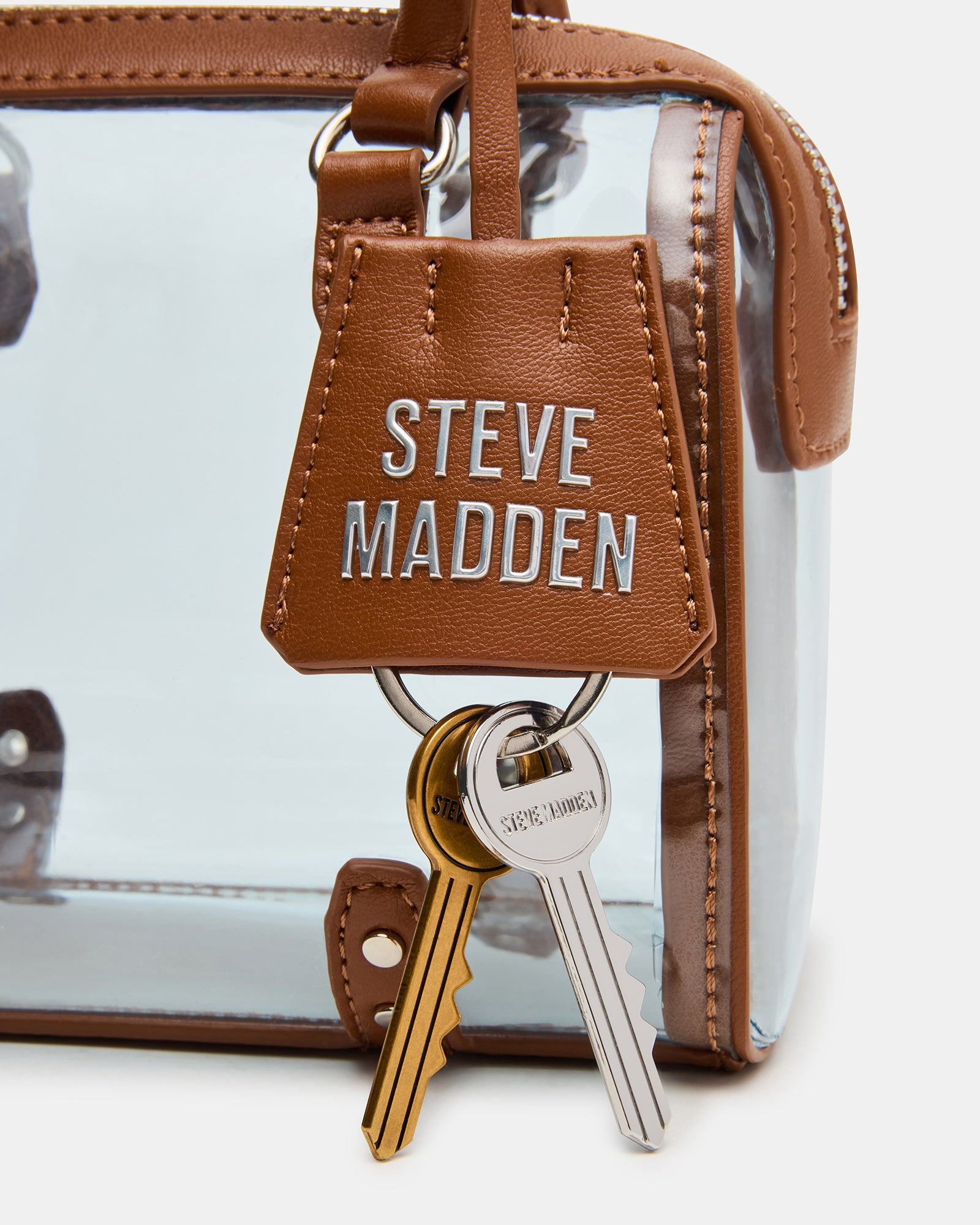 Close-up of clear tote bag showing interior space for essentials