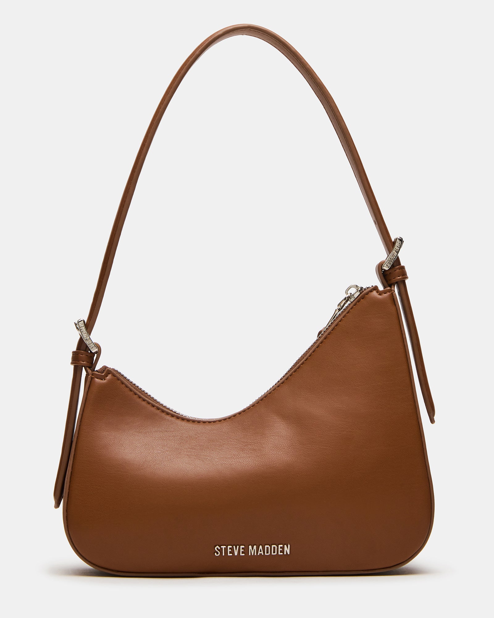 Model carrying the bag as a shoulder bag in city setting