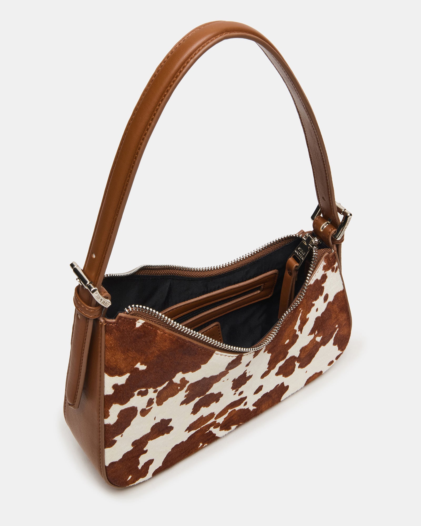 Side angle showing the asymmetrical design and zip closure