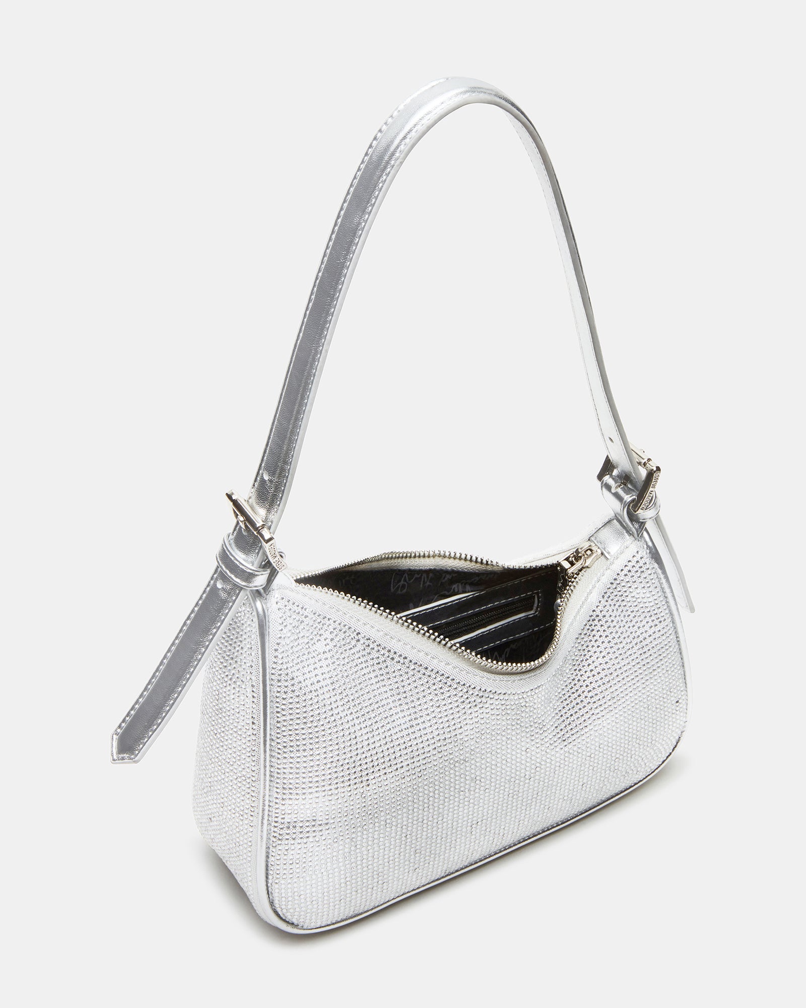 Asymmetrical shoulder bag styled with casual wear.