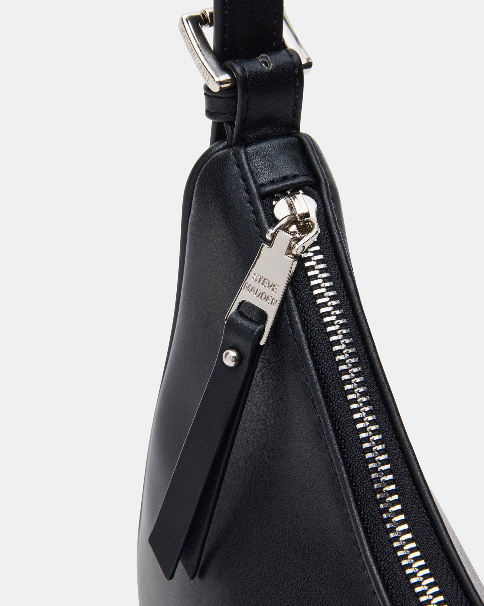 Side angle of the black leather shoulder bag with adjustable strap