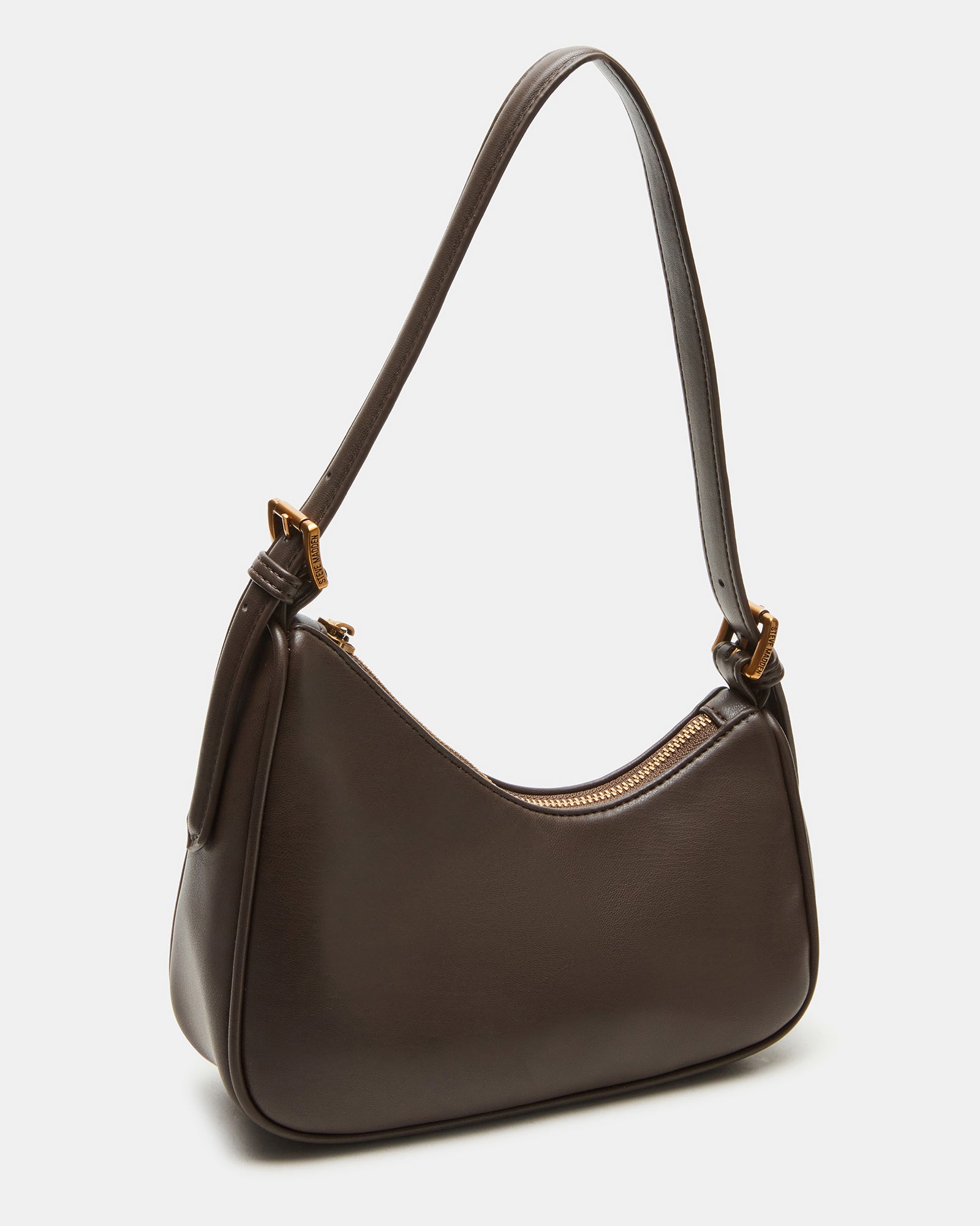 Model wearing the black shoulder bag in a casual setting.
