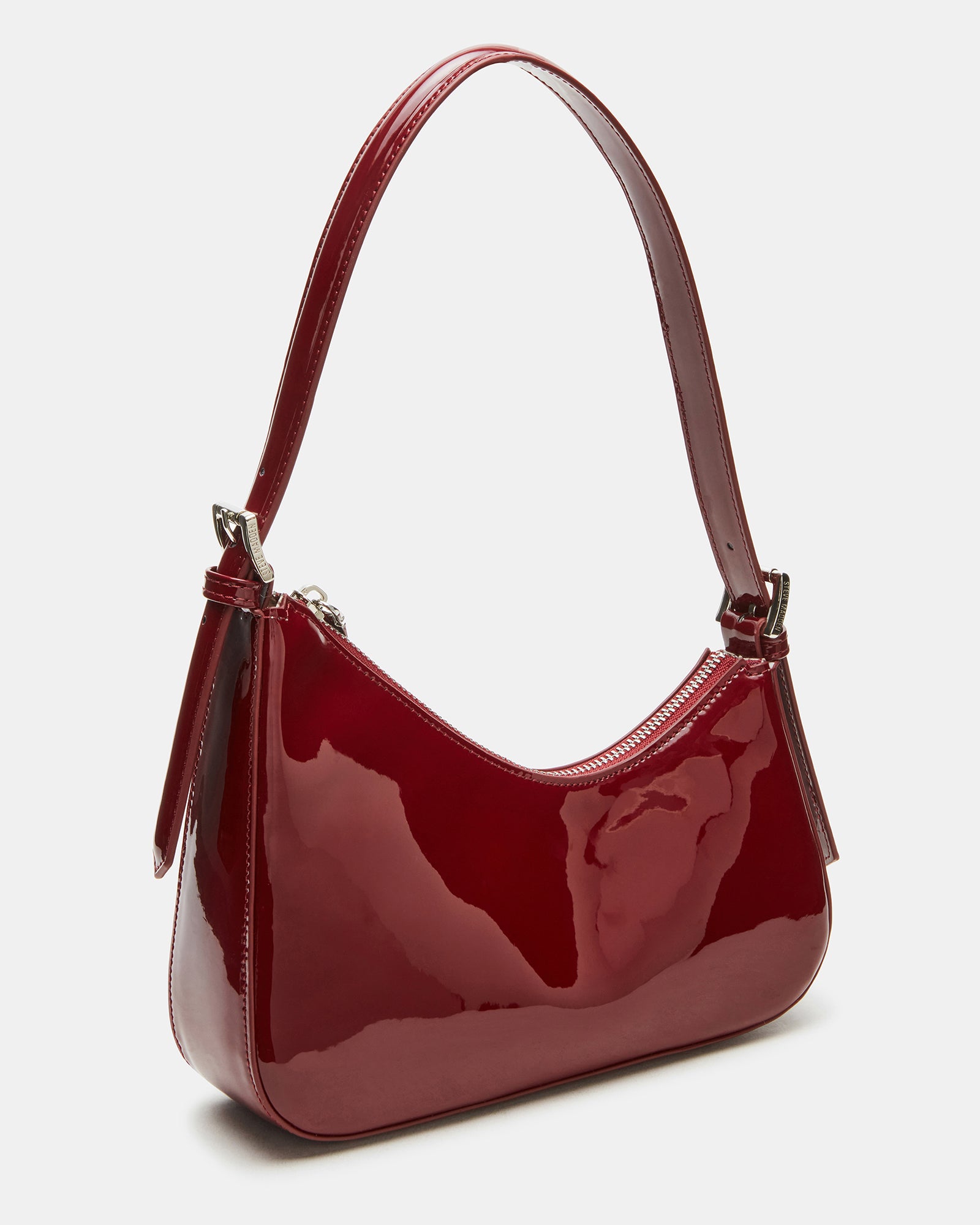 Stylishly worn wine shoulder bag perfect for a day out.