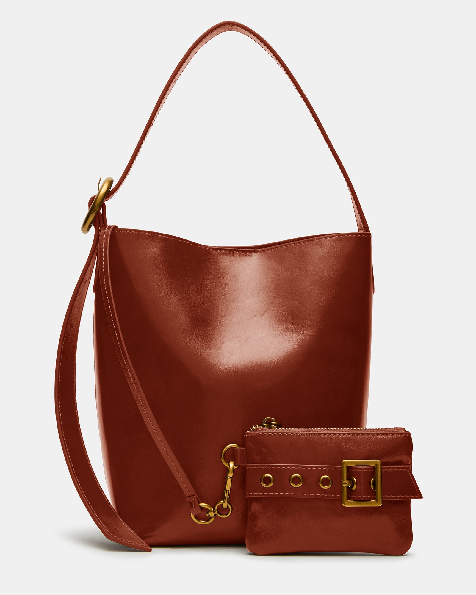 Rust leather shoulder bag with rounded hardware and magnetic snap closure, ideal for daily use