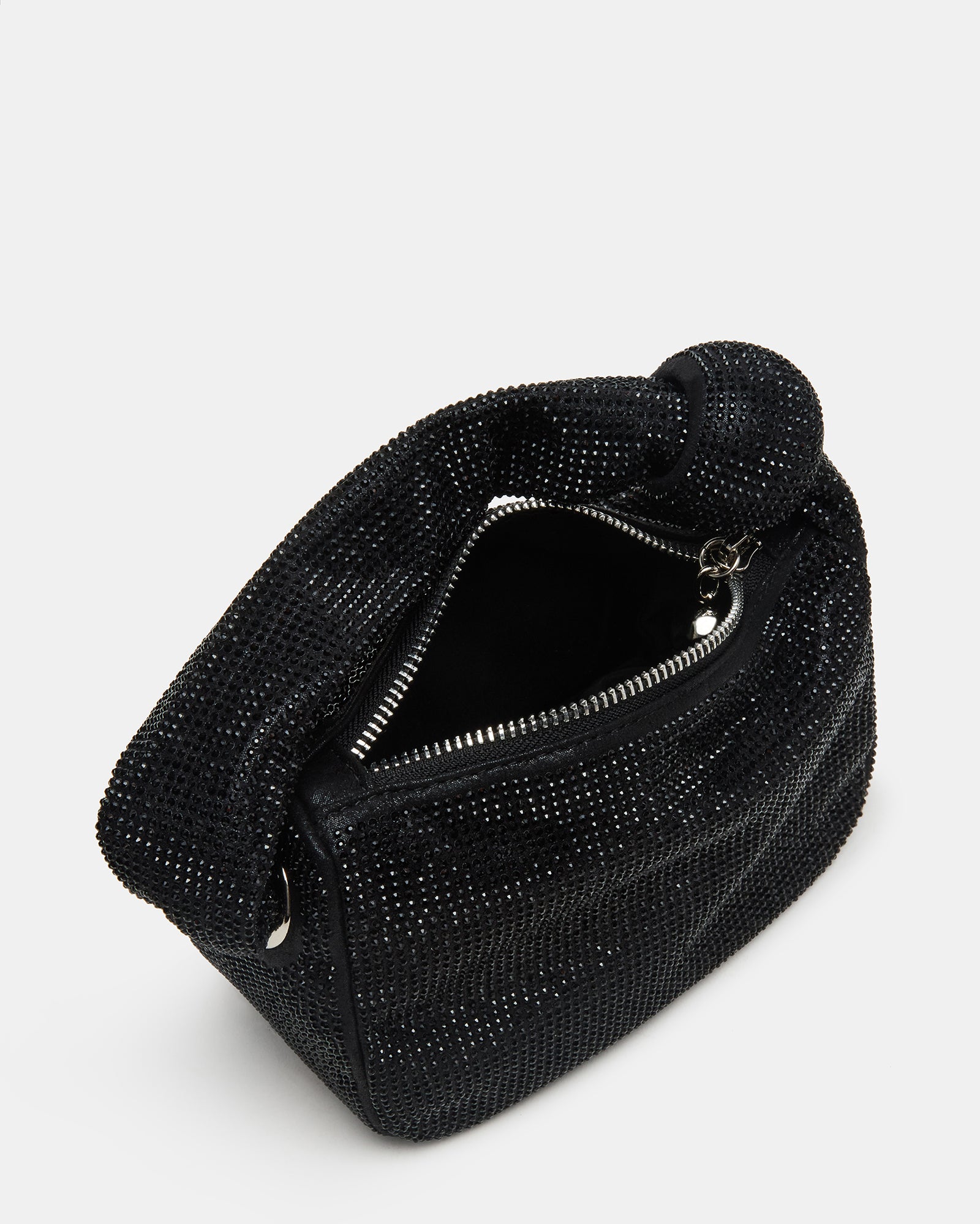 Mini top handle bag styled with evening wear for a night out