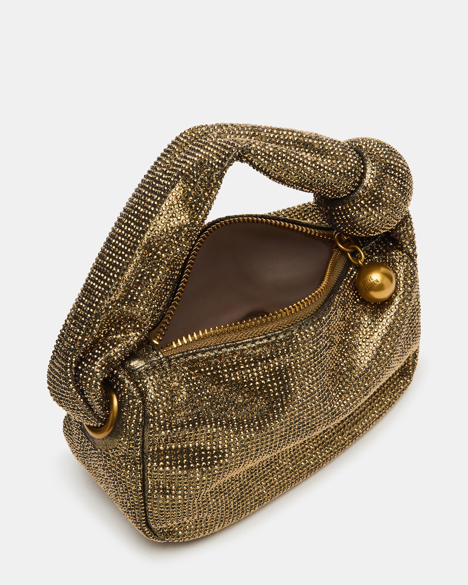 Close-up of the crystal-encrusted design on the bronze evening bag.