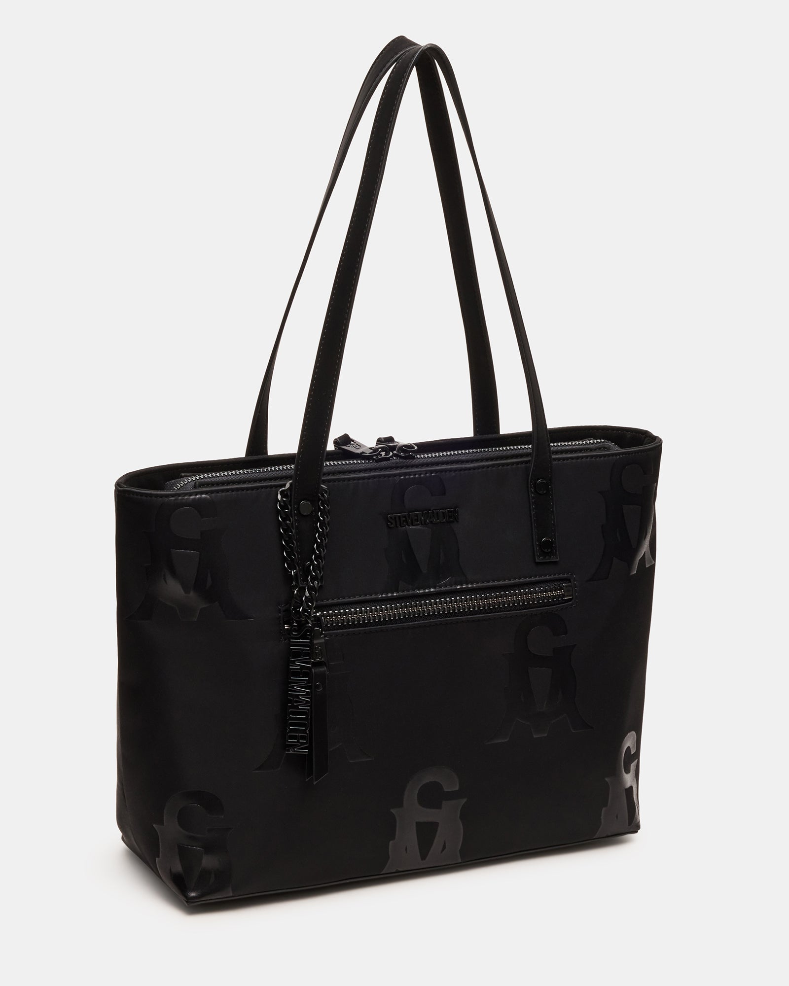 Front view of black shoulder bag with top zipper and logo charm, styled for city commute
