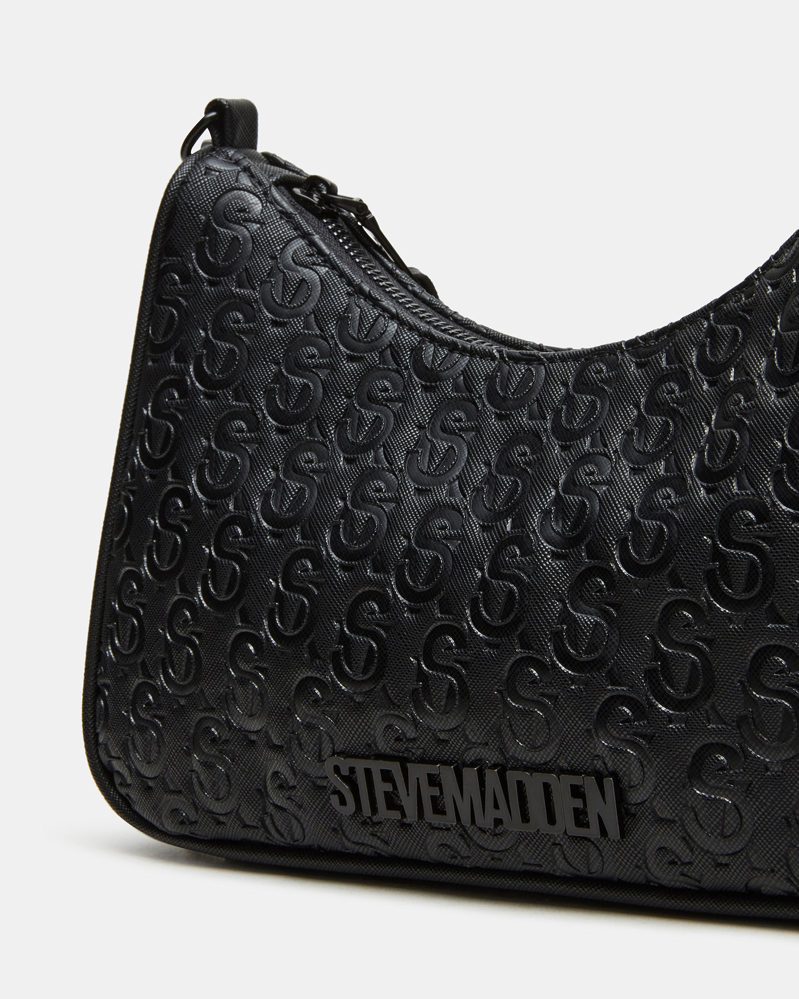 Side angle of the stylish Vice Bag with curb chain strap