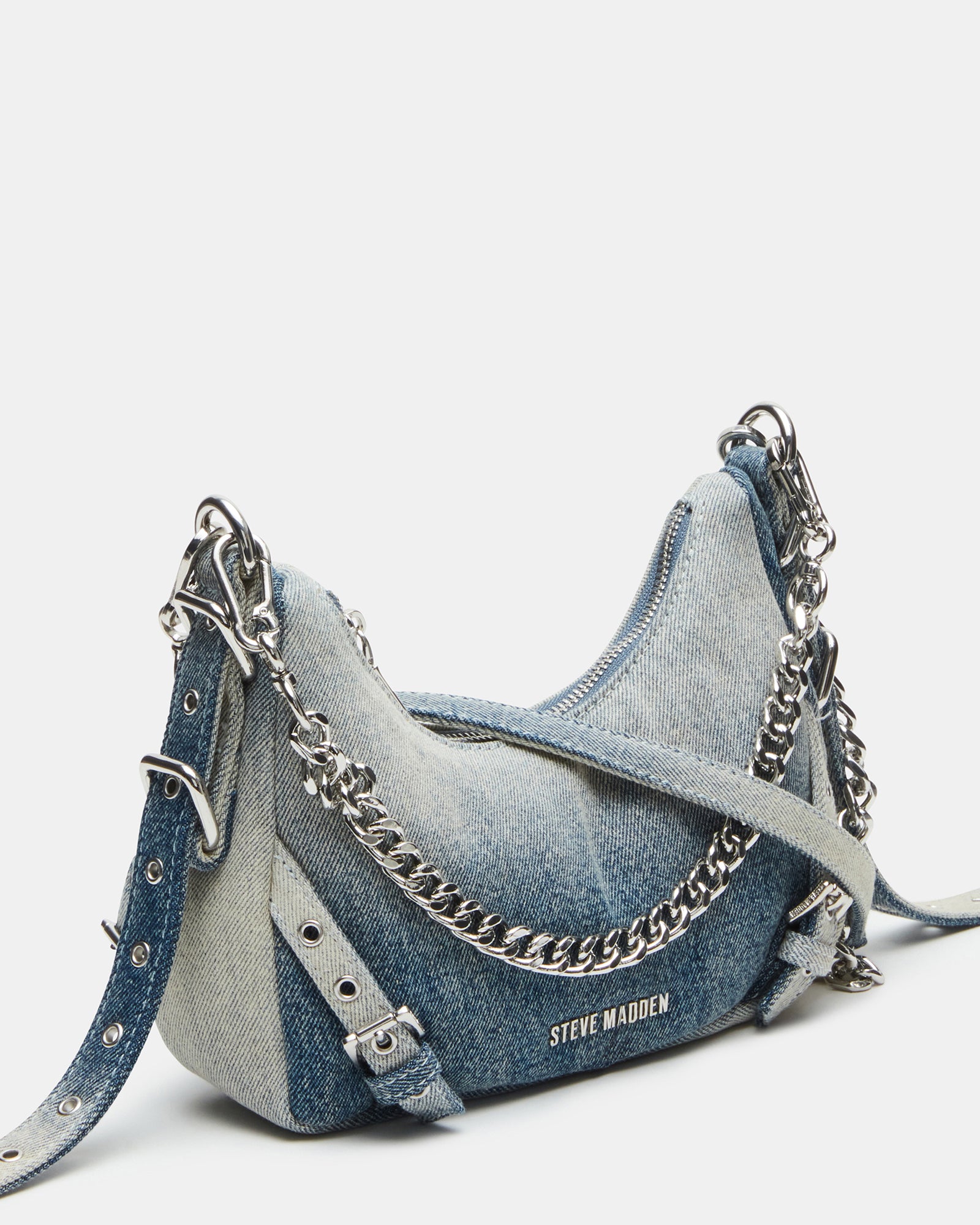 Close-up of the hobo bag with buckle and chain details.