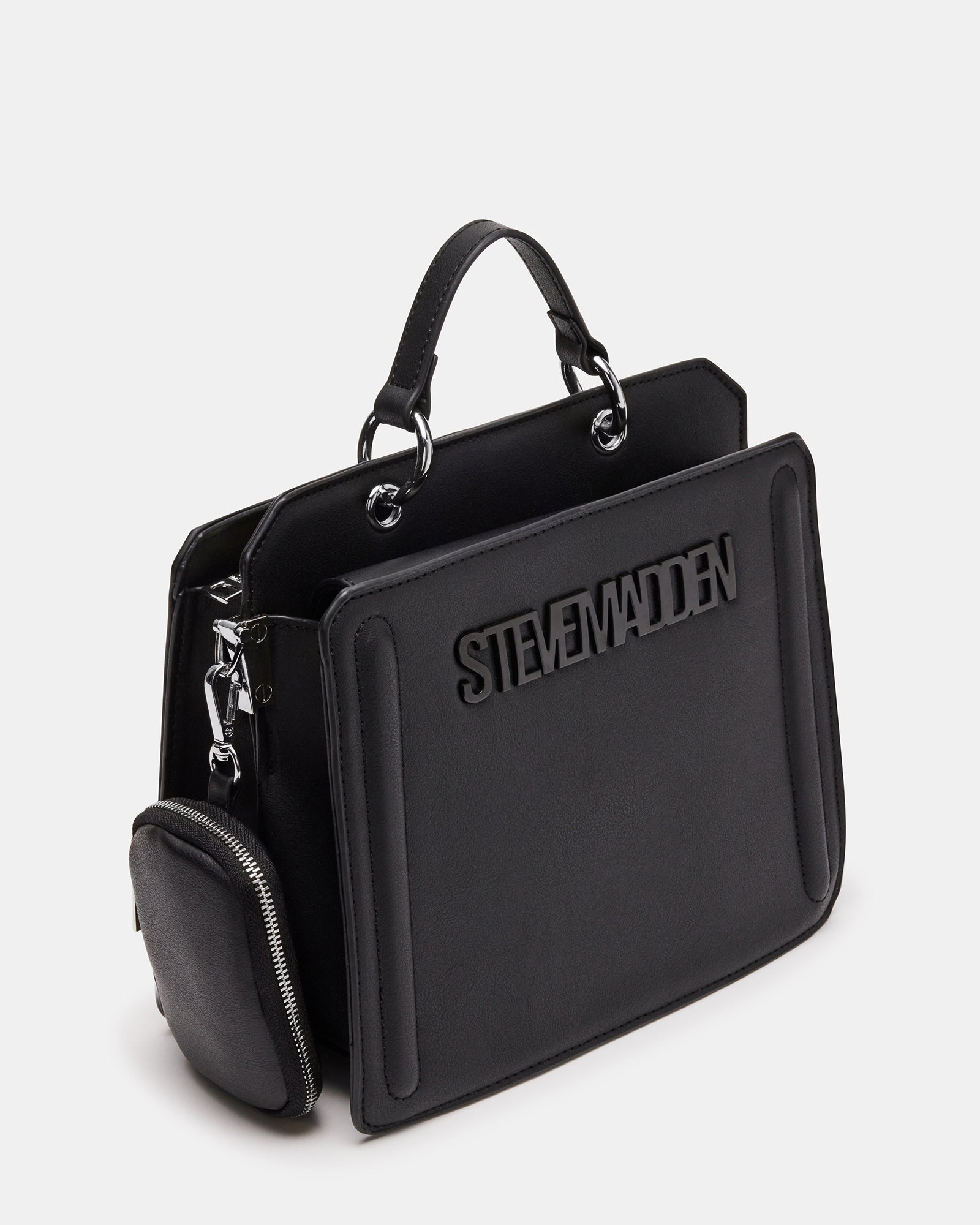 Styled shot of the top handle black bag paired with casual and office outfits