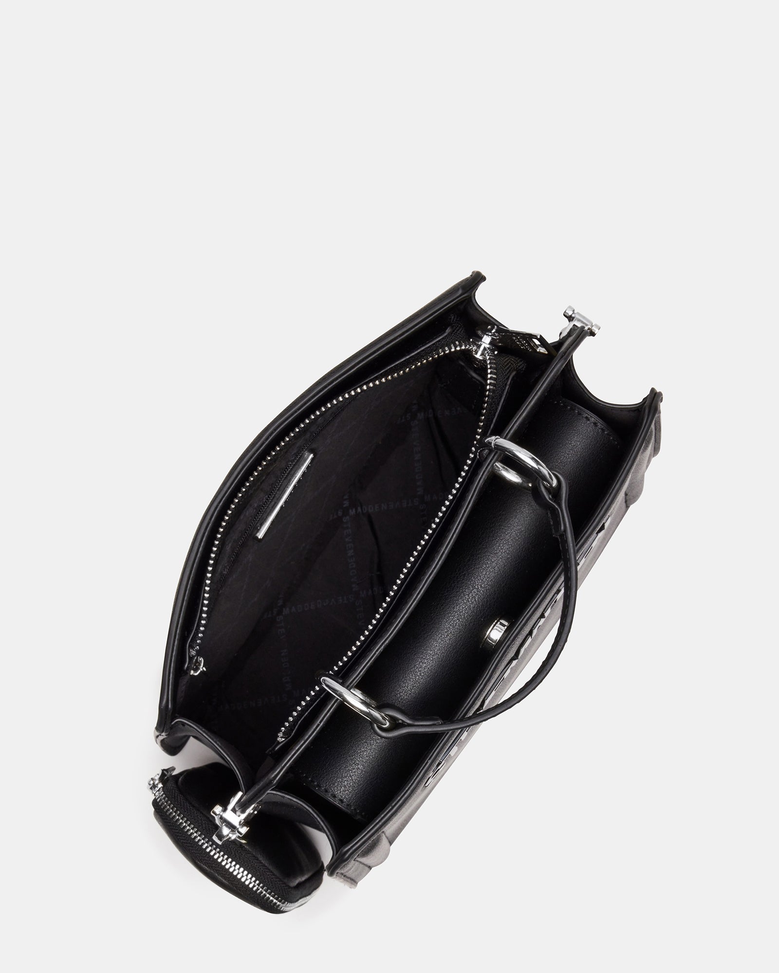 Styled shot of the top handle black bag paired with casual and office outfits