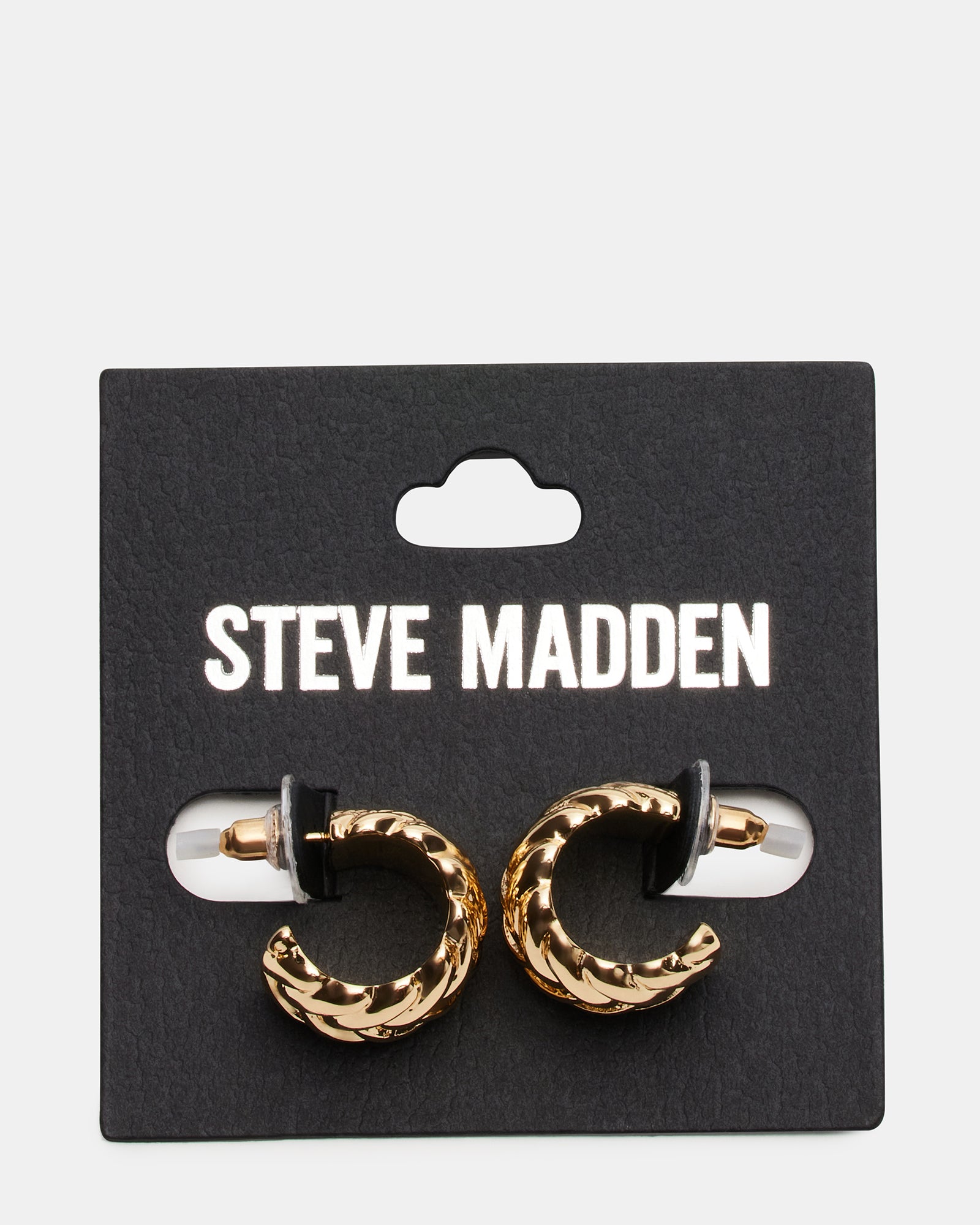 Model wearing woven 14K gold hoop earrings with a casual outfit.