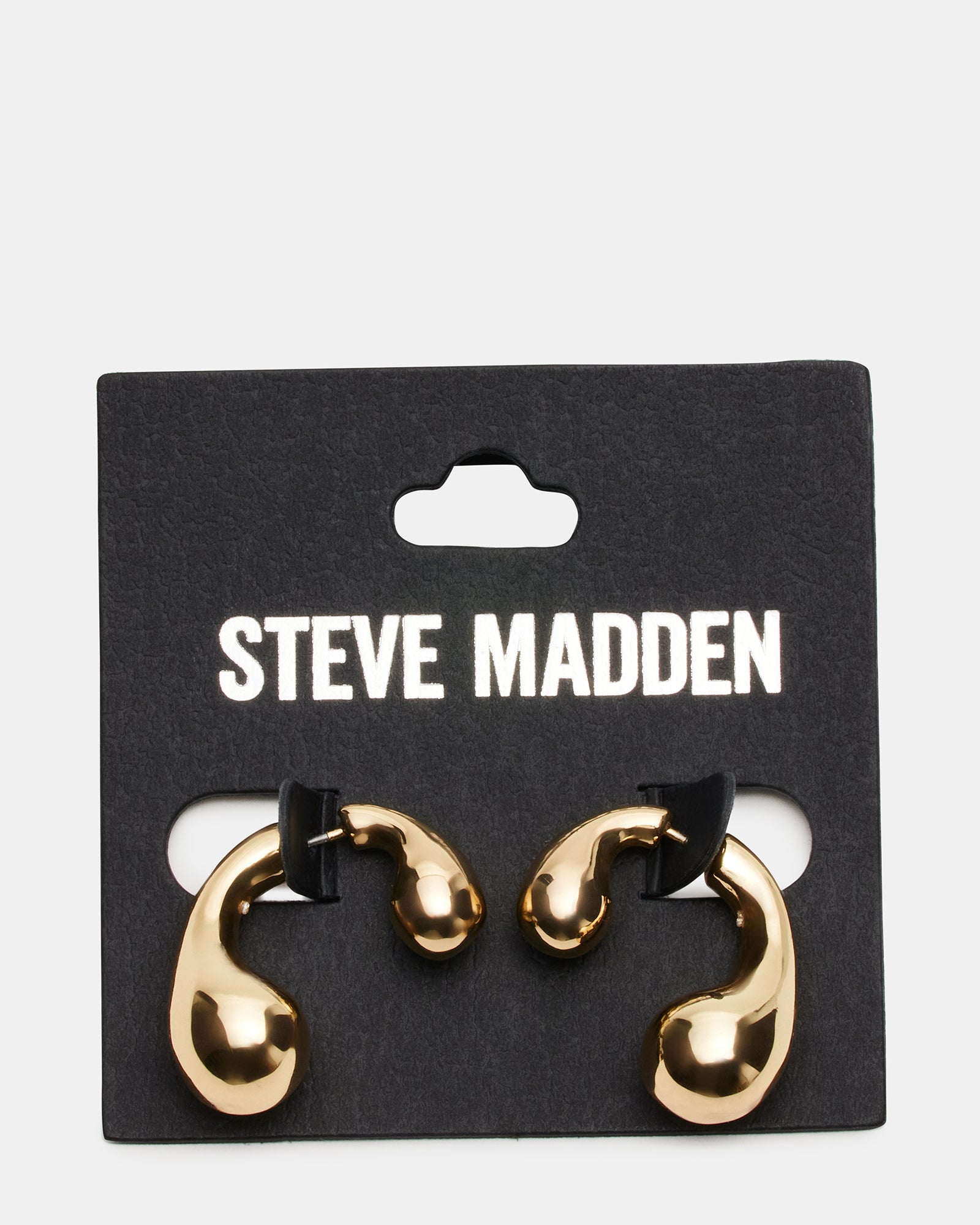 Close-up of the cubic zirconia detail on gold earrings