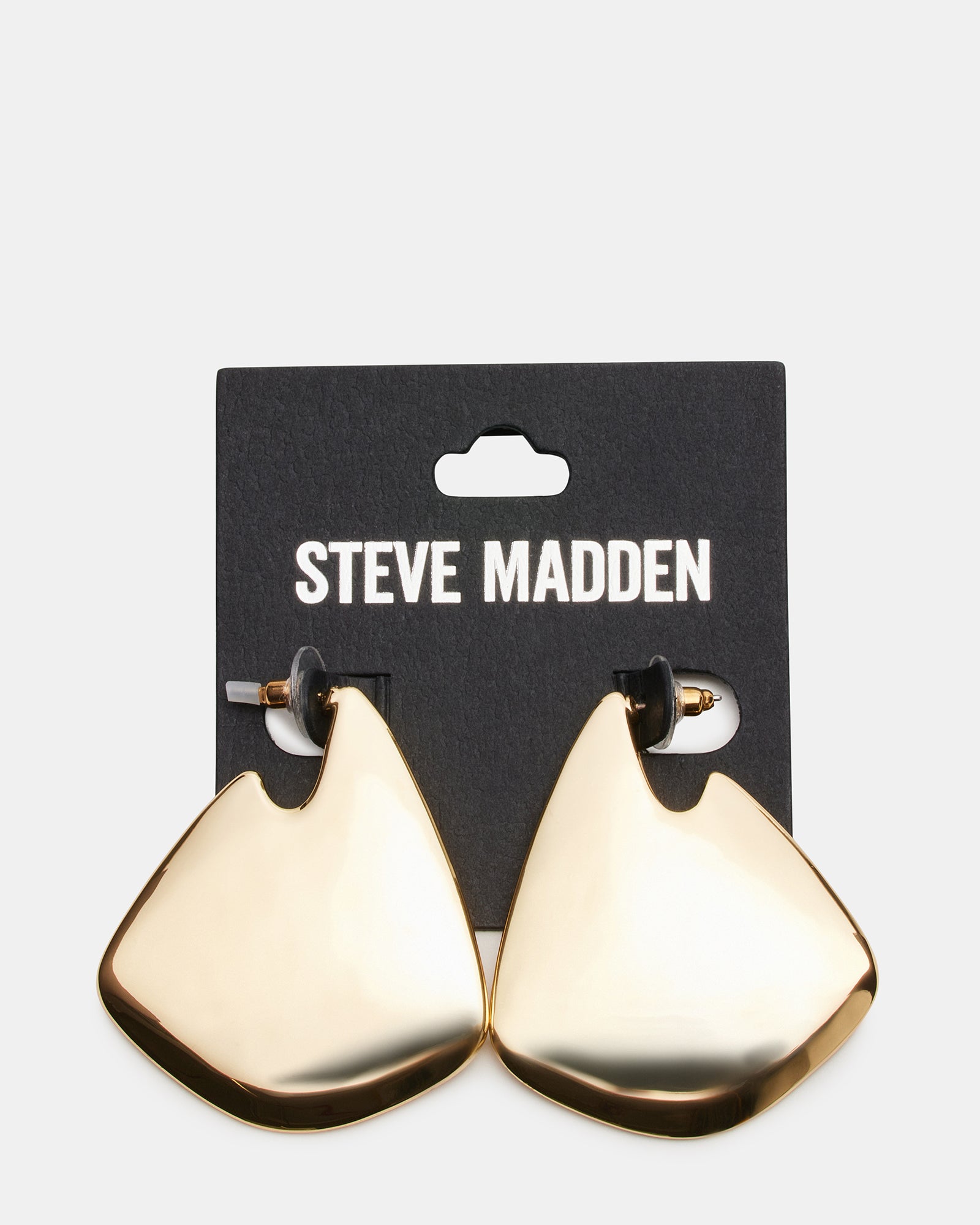 Styled shot featuring gold earrings with sleek hair and minimalist outfit