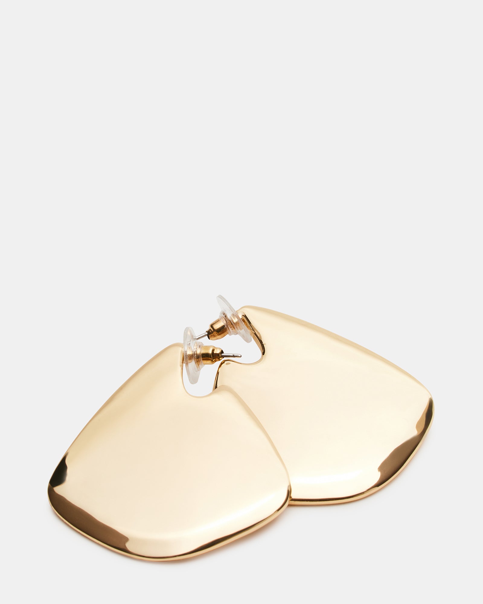 Close-up of post-back closure and texture of statement earrings gold