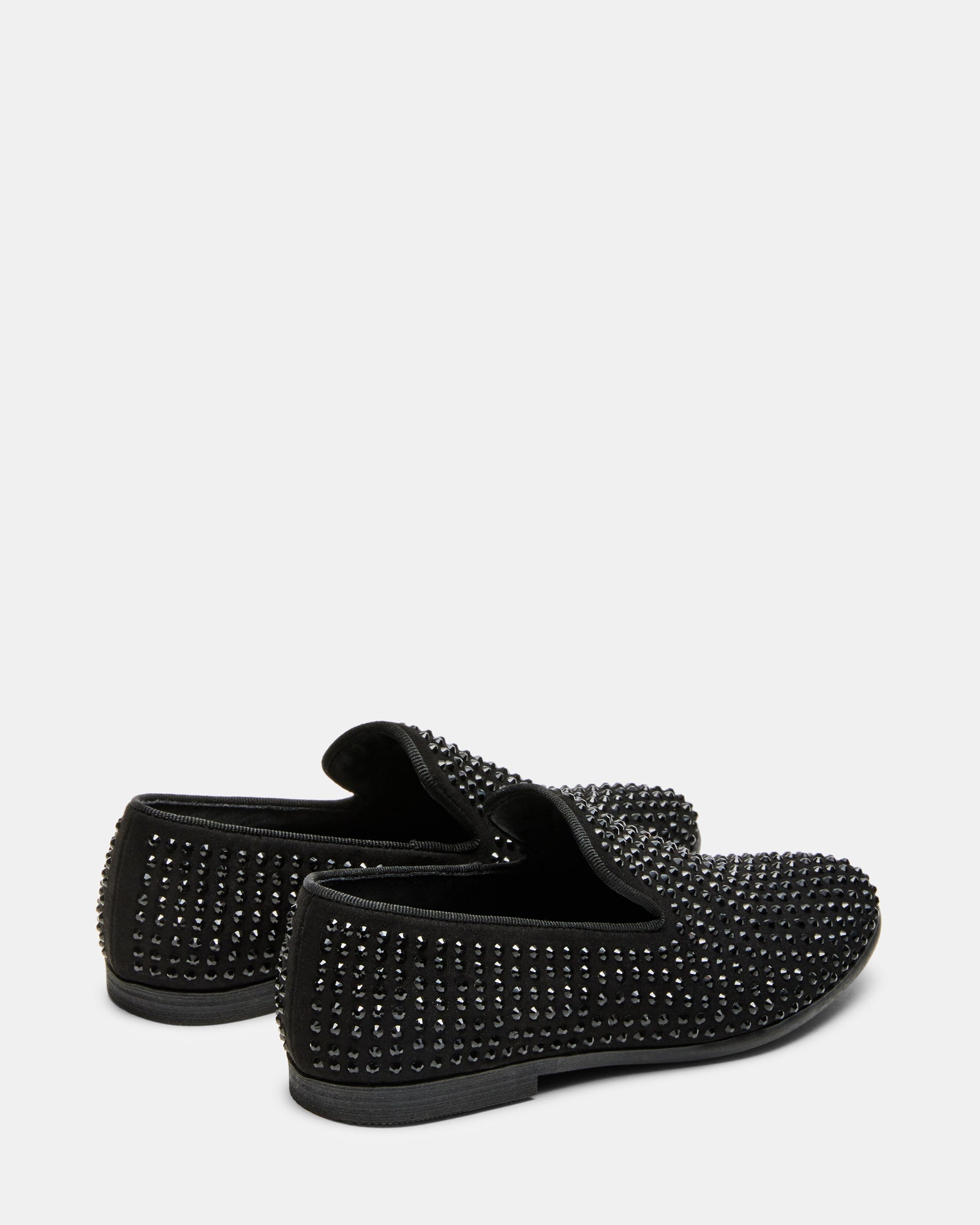 Boys wearing caviar black loafers at a formal event.