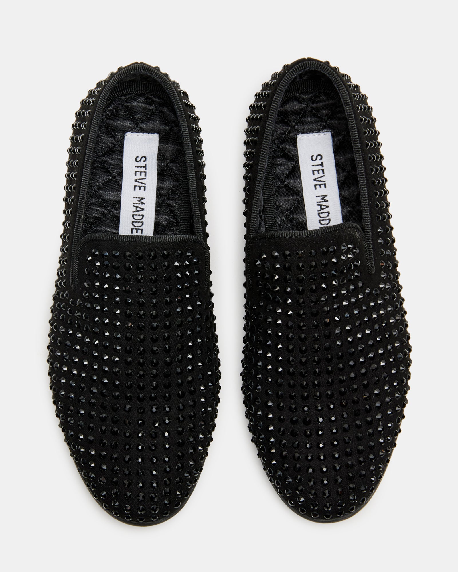 Close-up of boys caviar black dress loafers with rhinestone details.