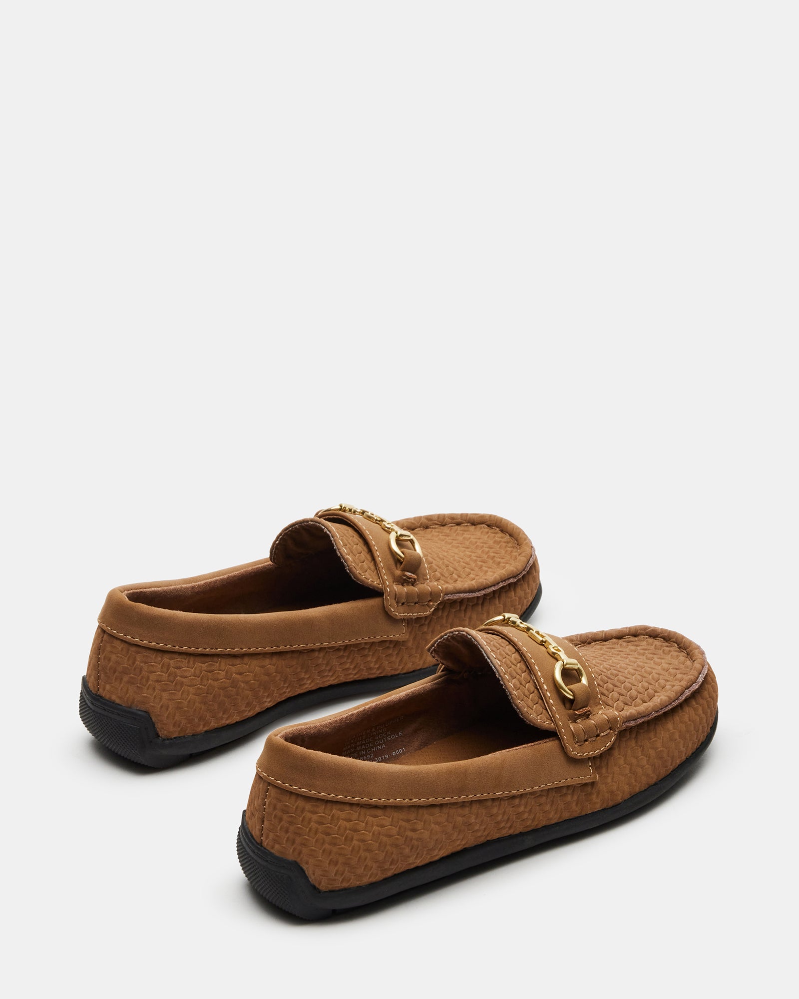 Side view of taupe kids dress shoes styled for formal wear