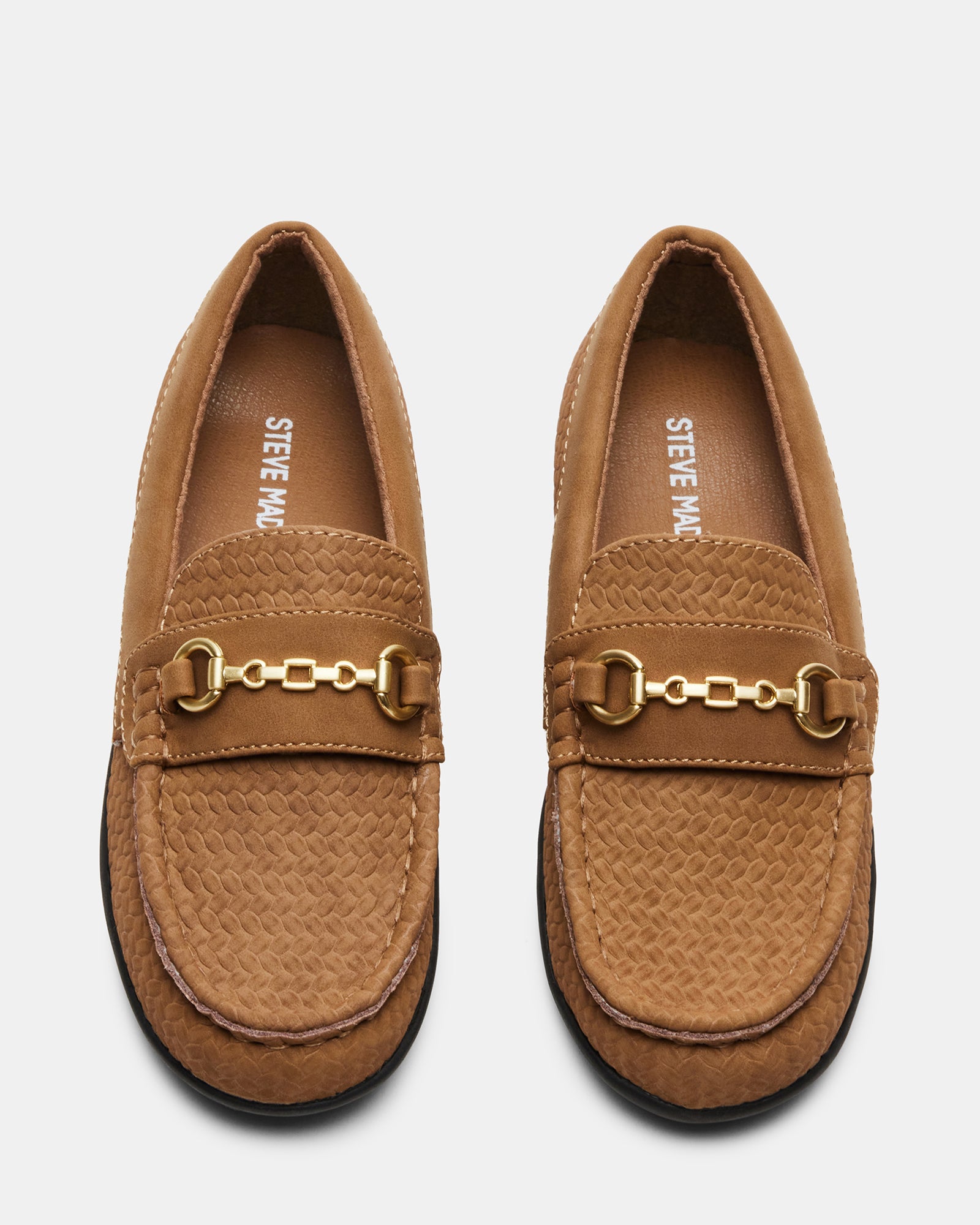 Close-up of taupe kids loafers showcasing horsebit hardware and leather texture