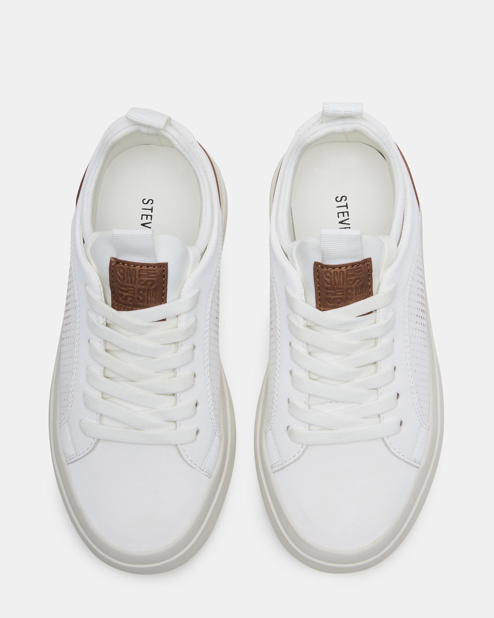 Top-down angle of childrens sneakers paired with jeans—ideal for casual school days
