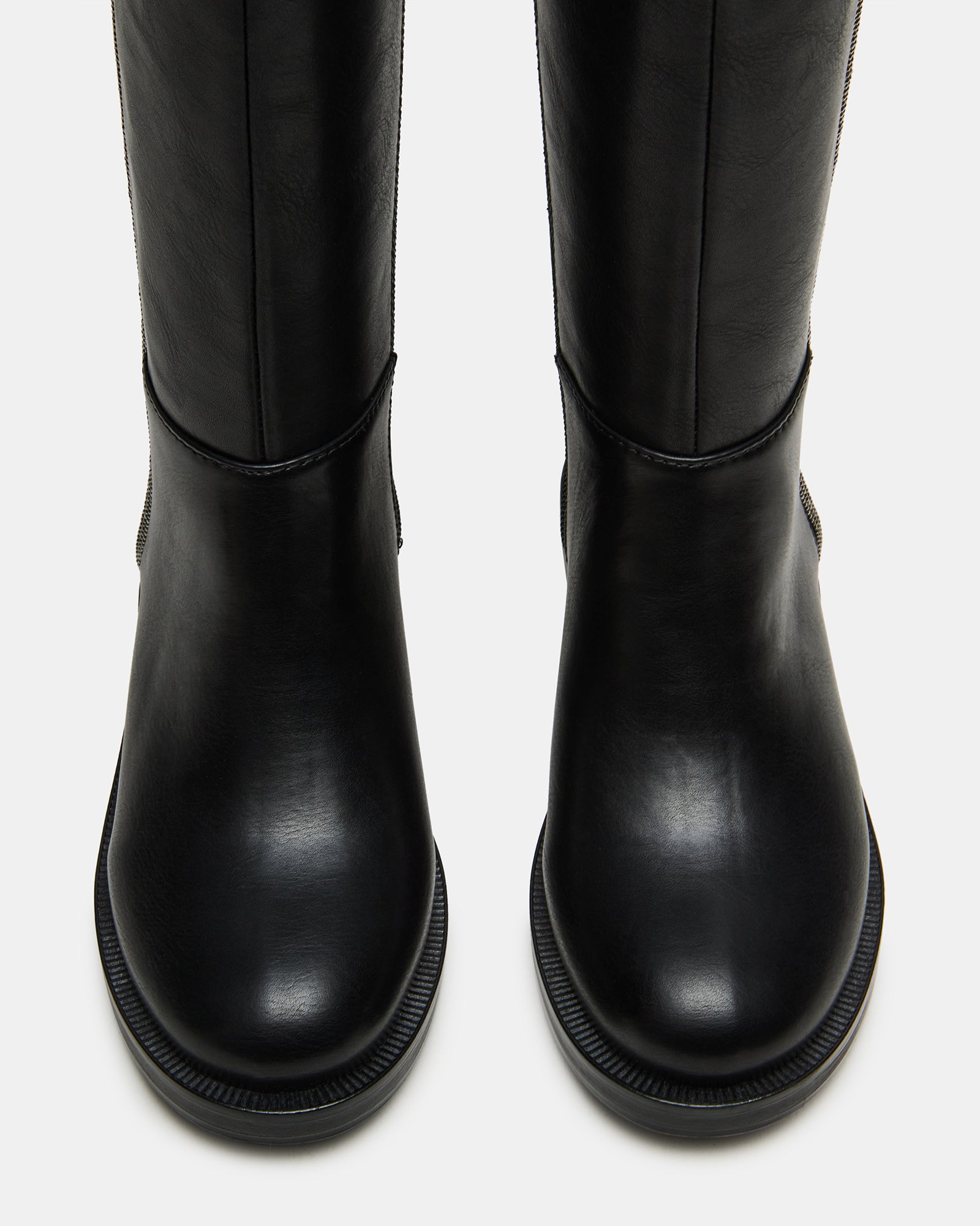 Side view of Alix kids vegan leather knee-high boots with rounded toes