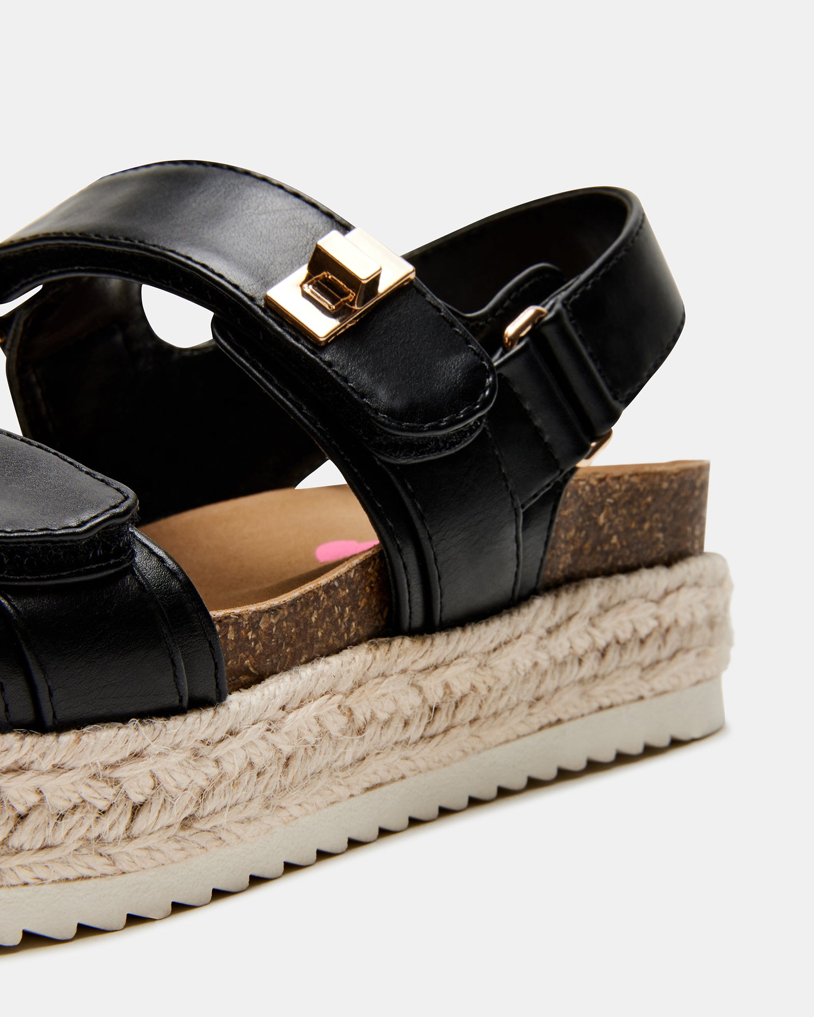Bigmona black sandals for kids shown worn during a sunny park outing