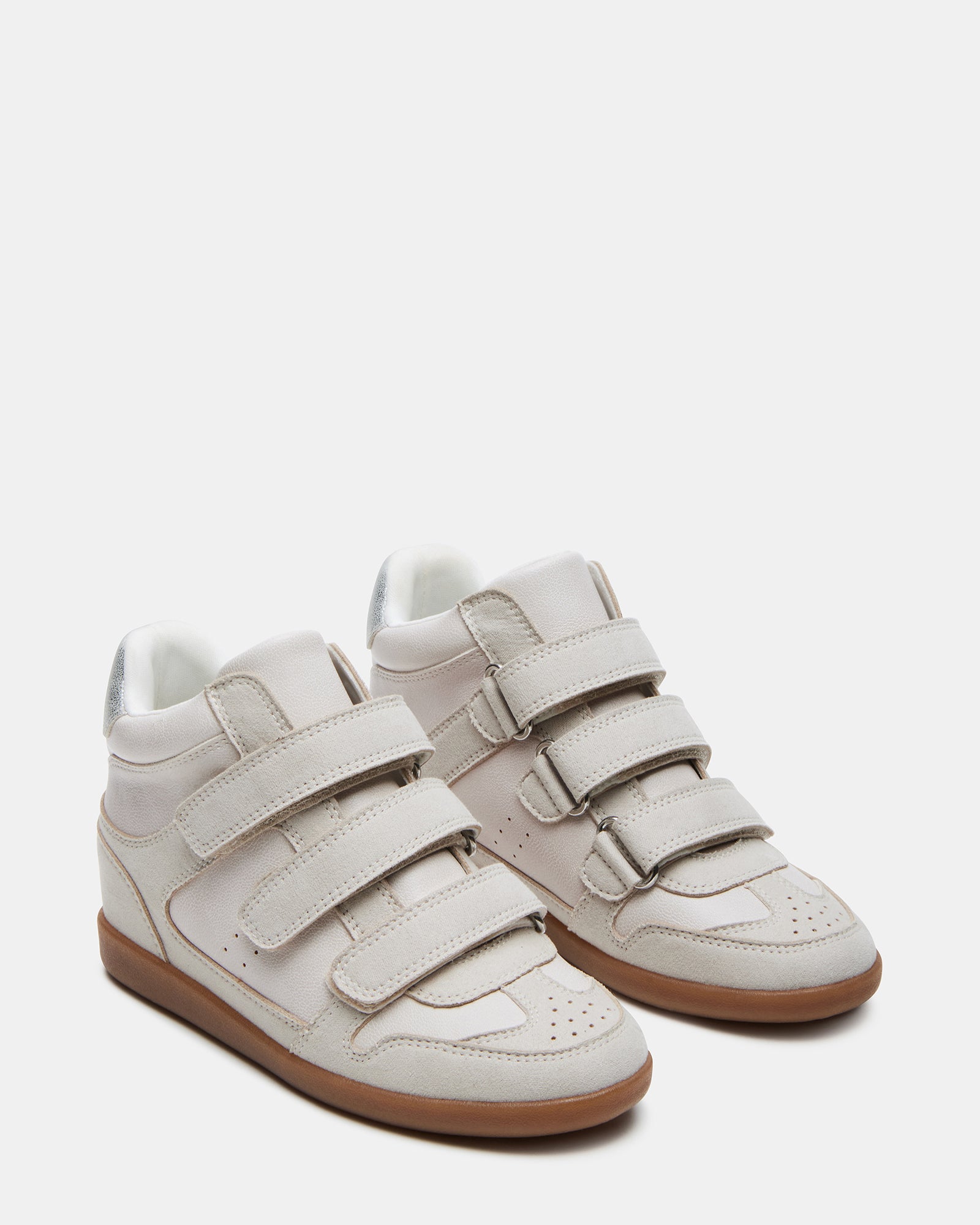 Side profile of Bobbi kids sneakers showing ankle support.