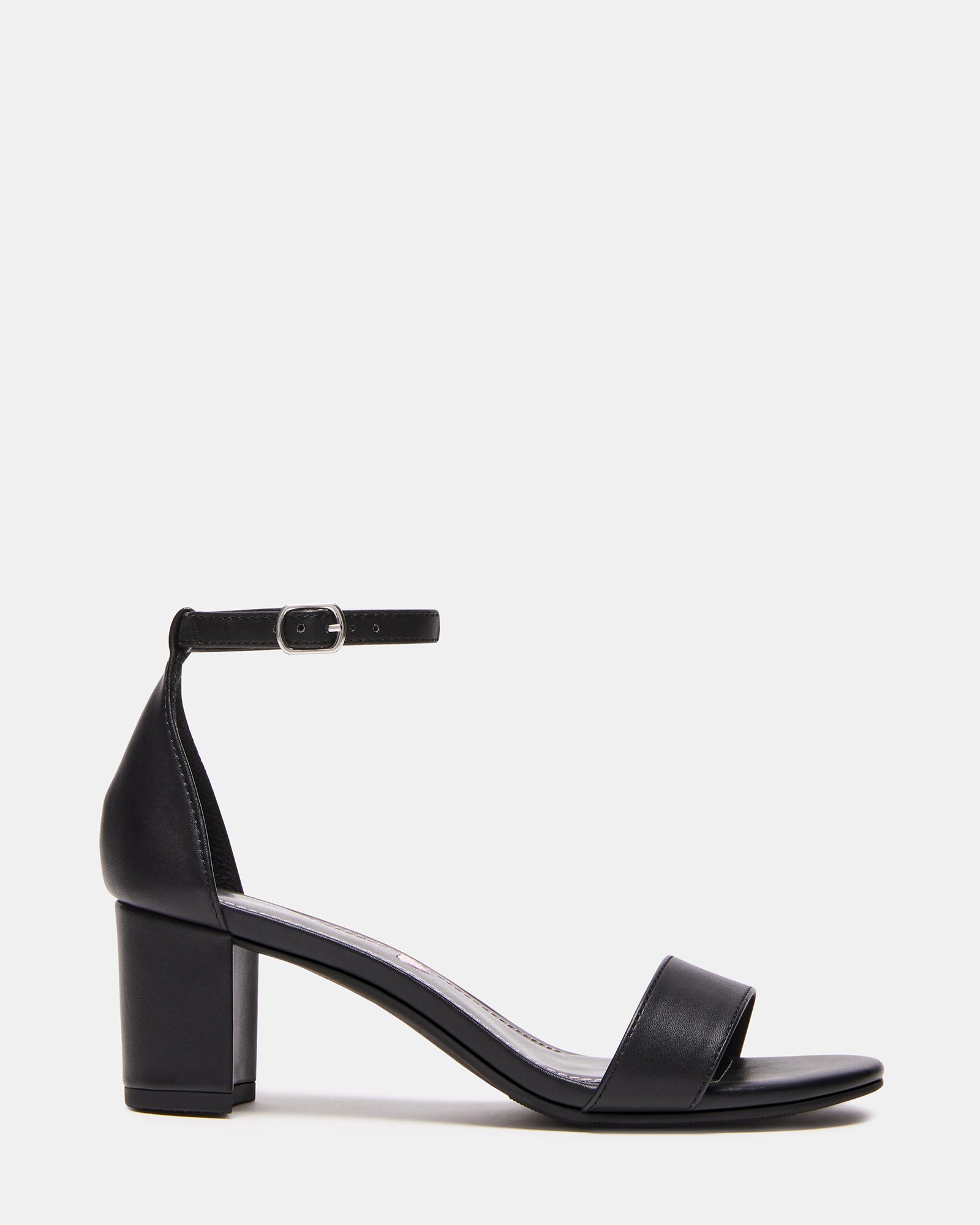 Side view of black kids sandals with block heel and ankle strap, perfect for dressy outfits
