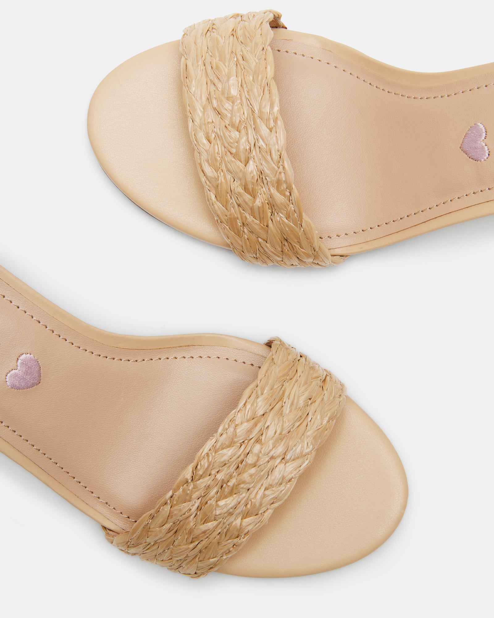 Side profile of kids braided dress sandals with low block heels