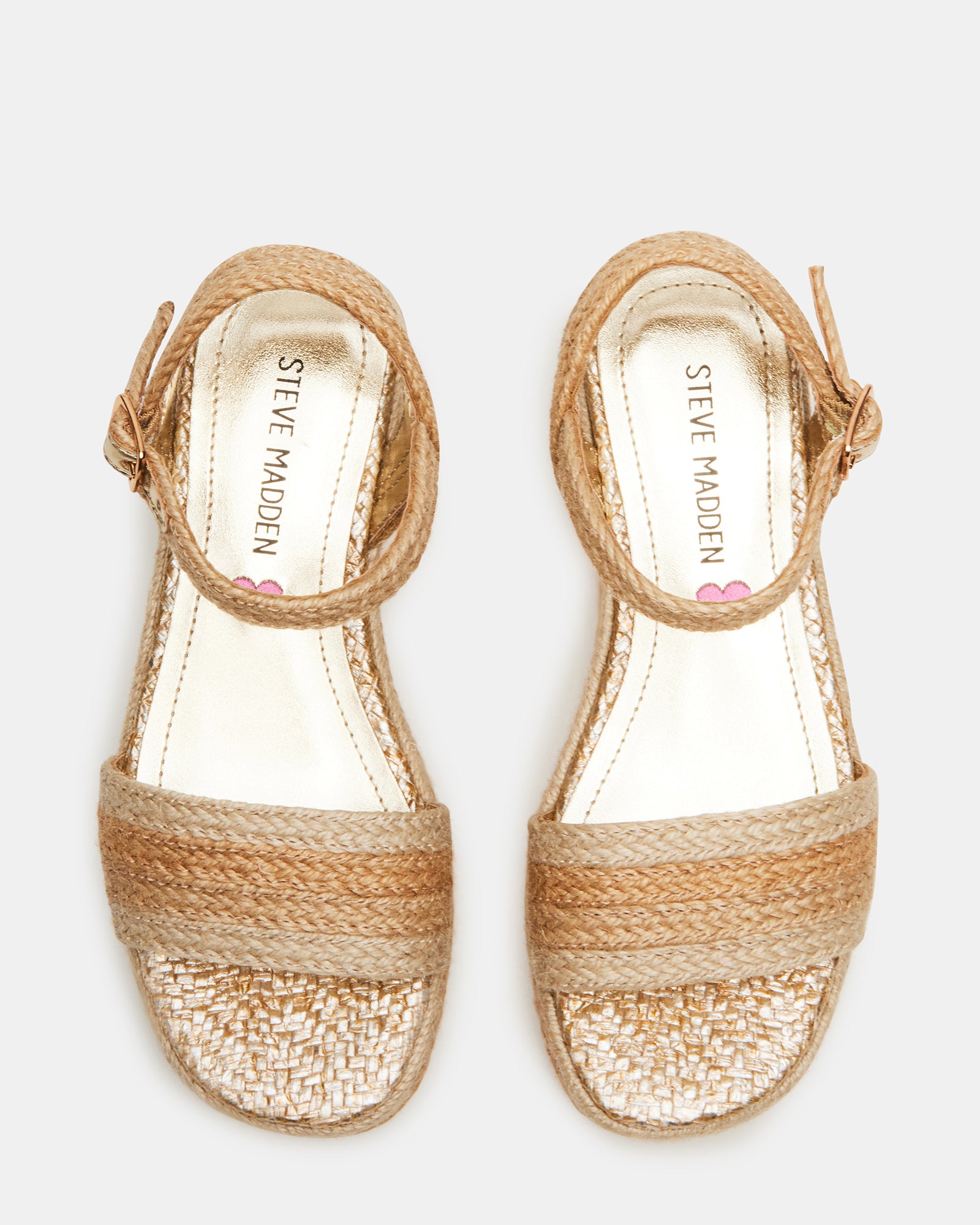 Cleo Natural Kids Sandals in outdoor setting, showing platform design.