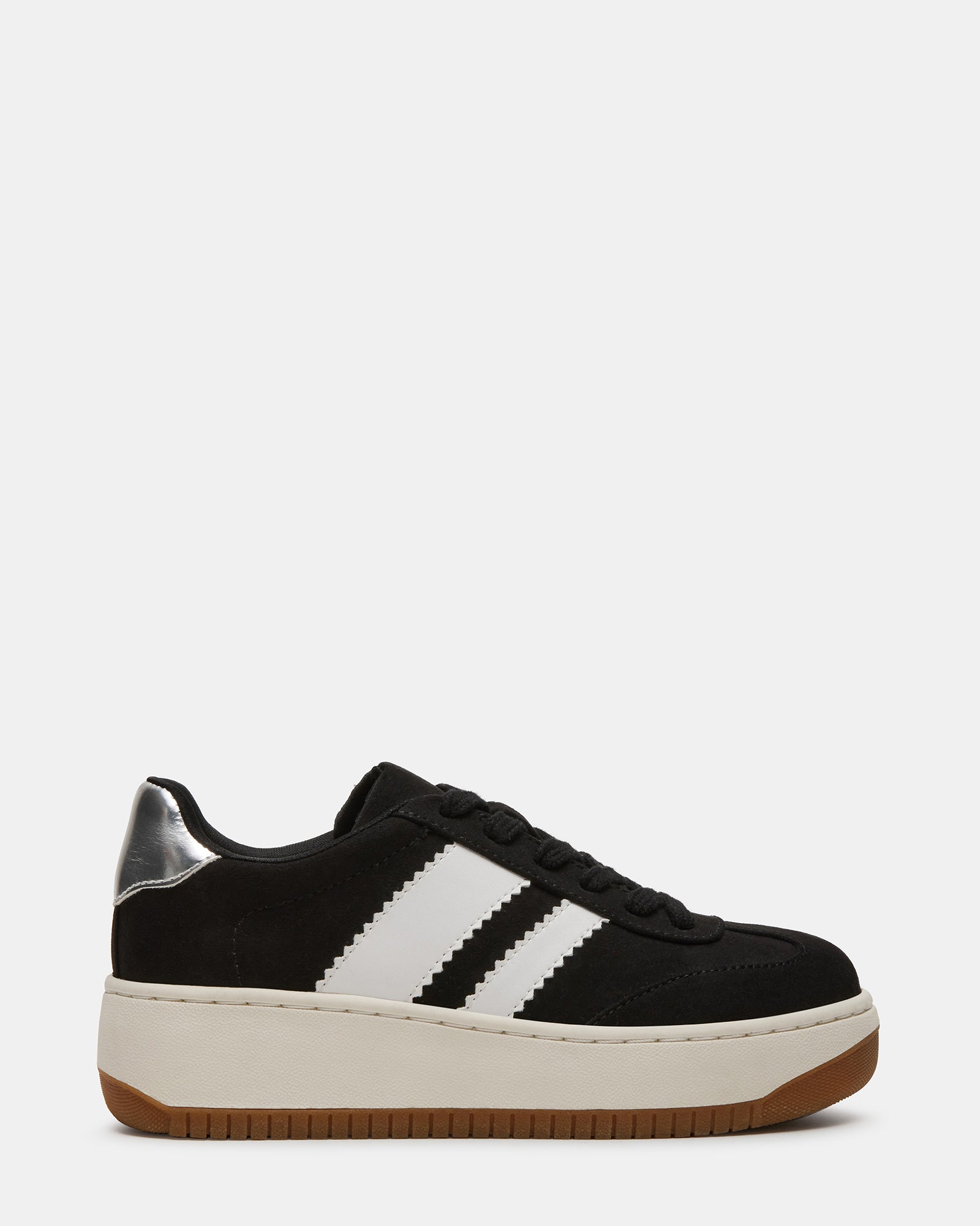 Kids' FIELD Black vegan sneakers side view on a playground