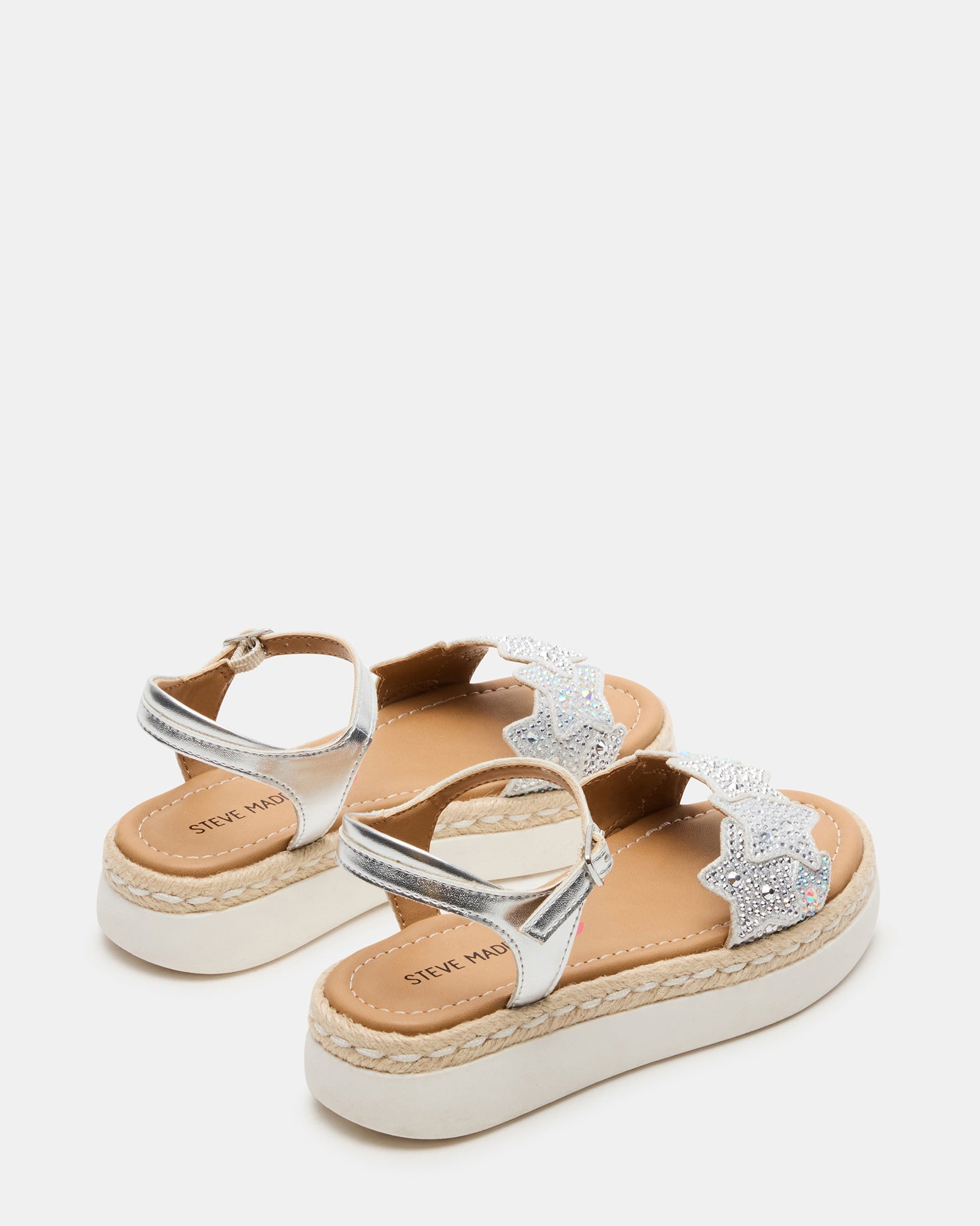 Side view showing the wedge heel and ankle strap for secure fit