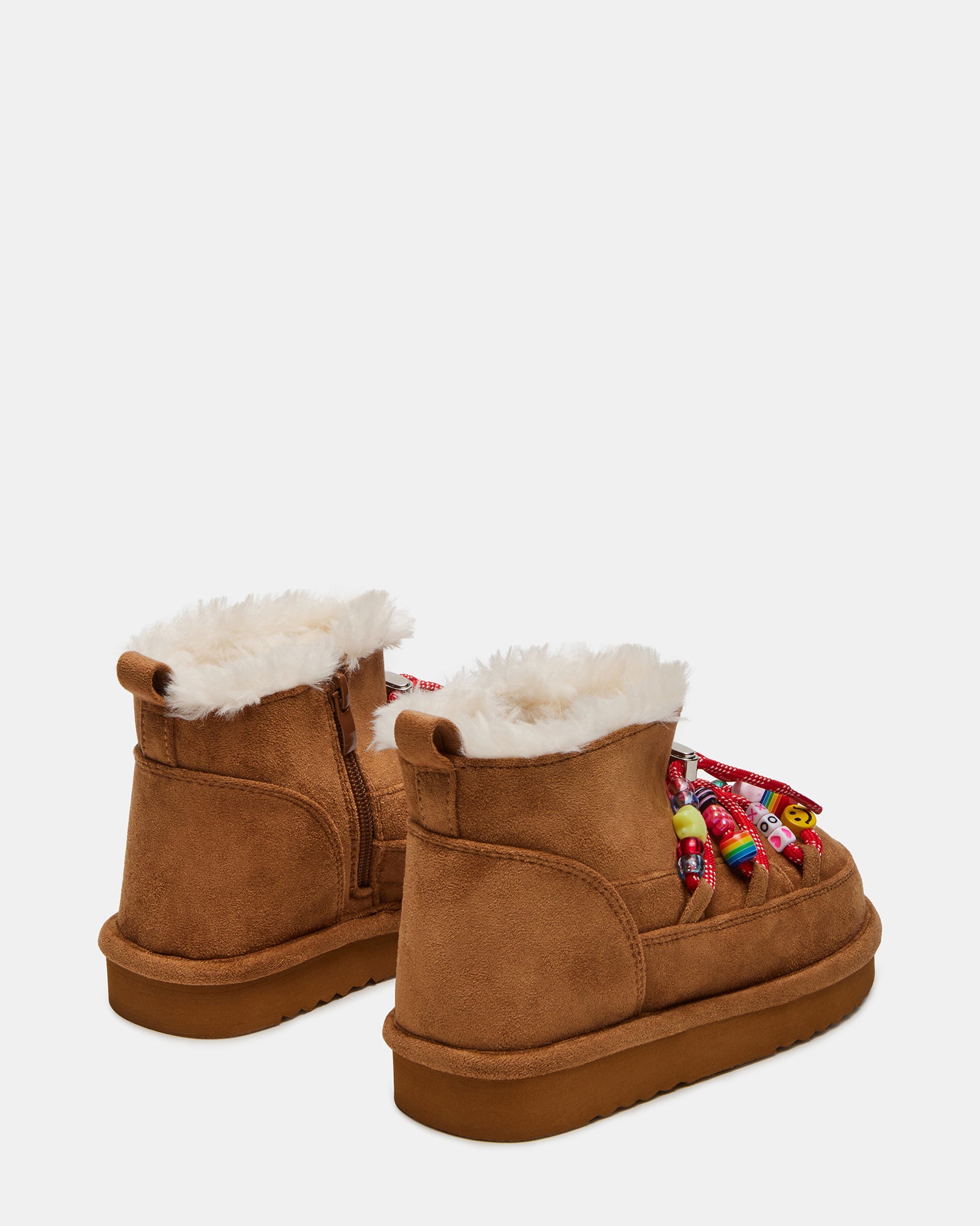 Kids boots styled with winter outfit—ideal for school mornings