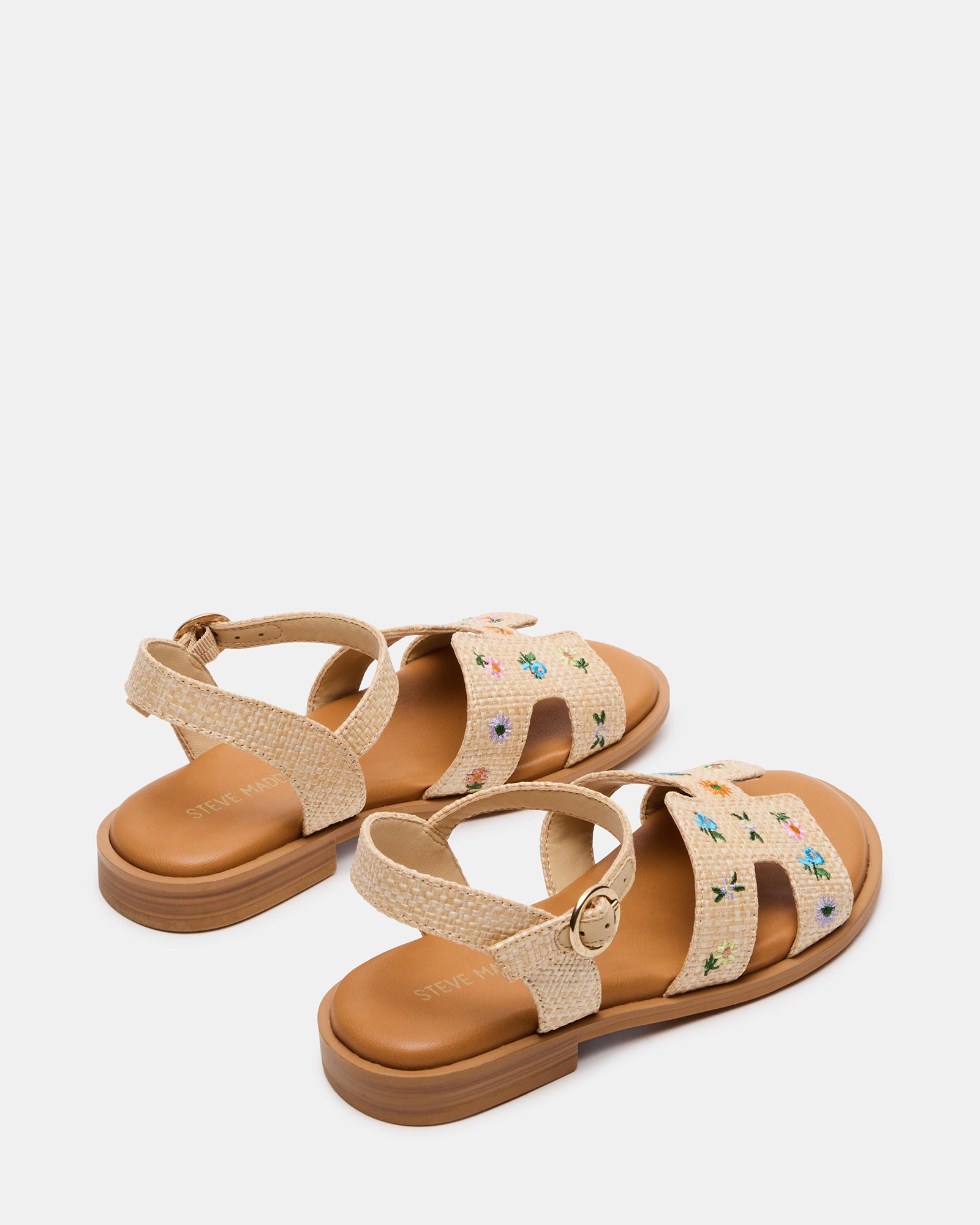 Side view of floral wedge sandals with ankle strap
