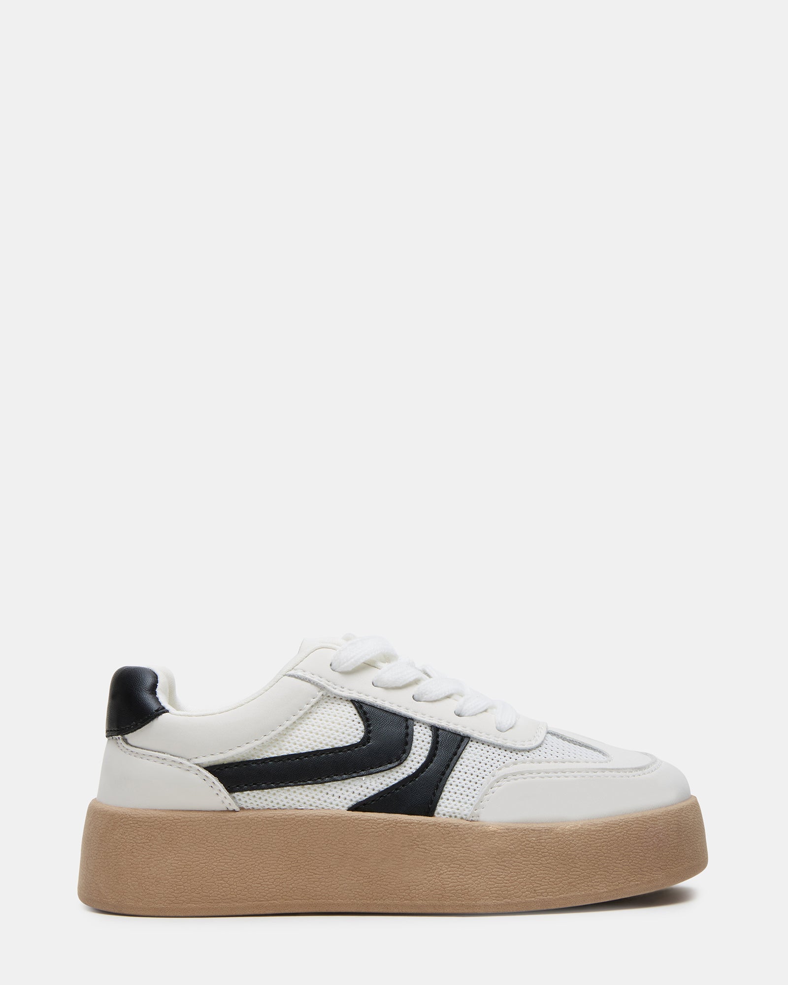 Front view of kids' white platform sneakers on a wooden background