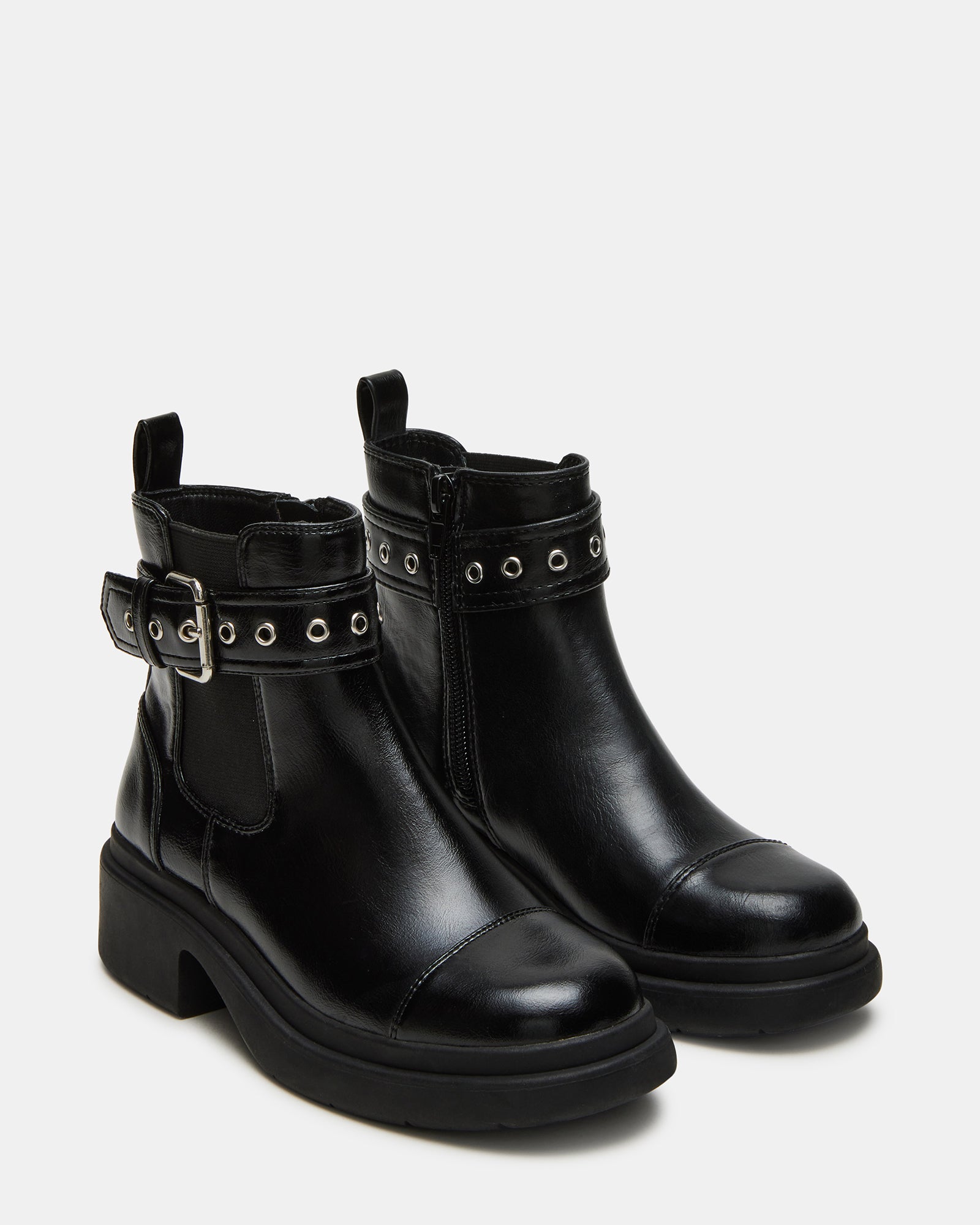 Top-down angle of kids ankle booties showing textured vegan leather upper