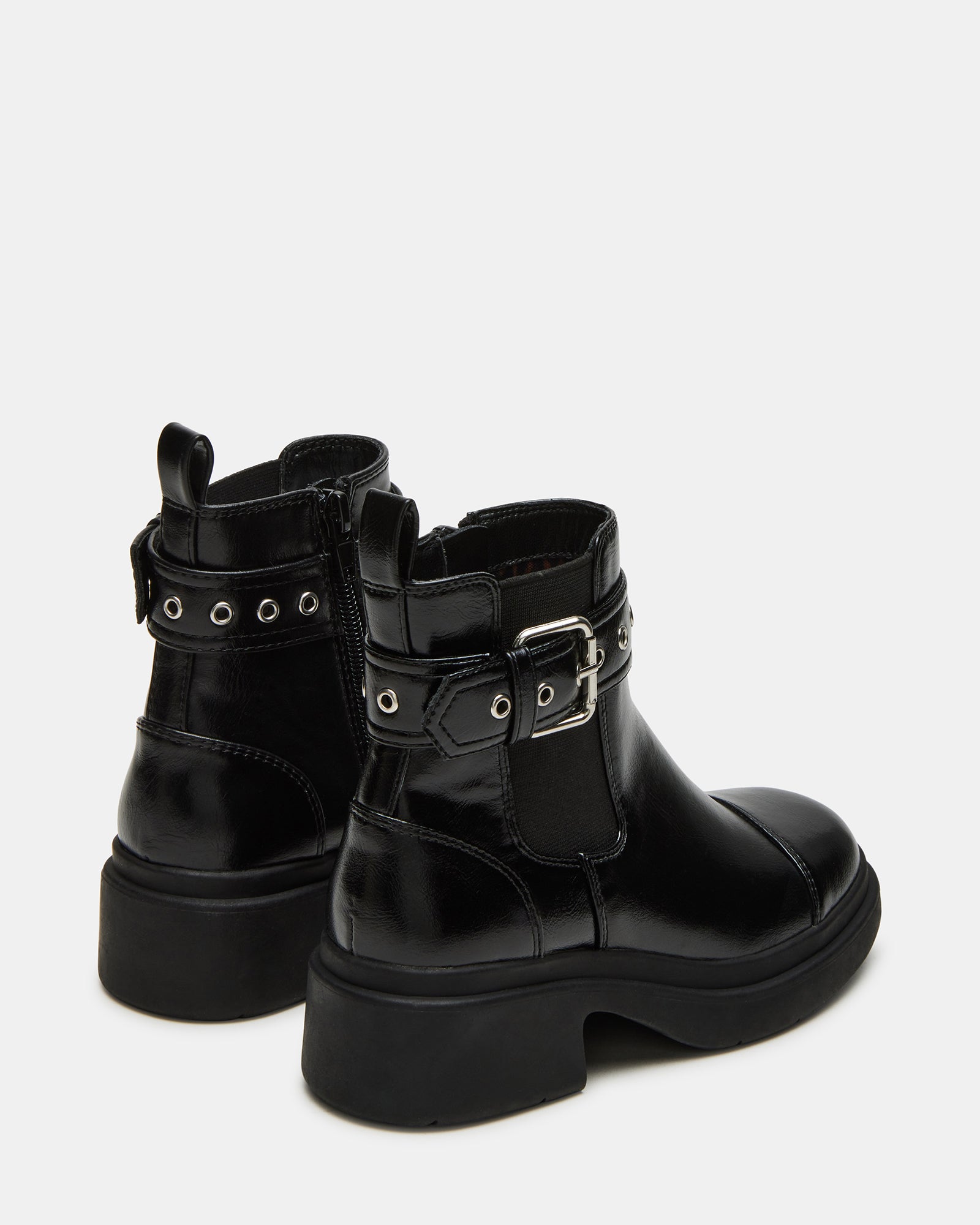 Top-down angle of kids ankle booties showing textured vegan leather upper