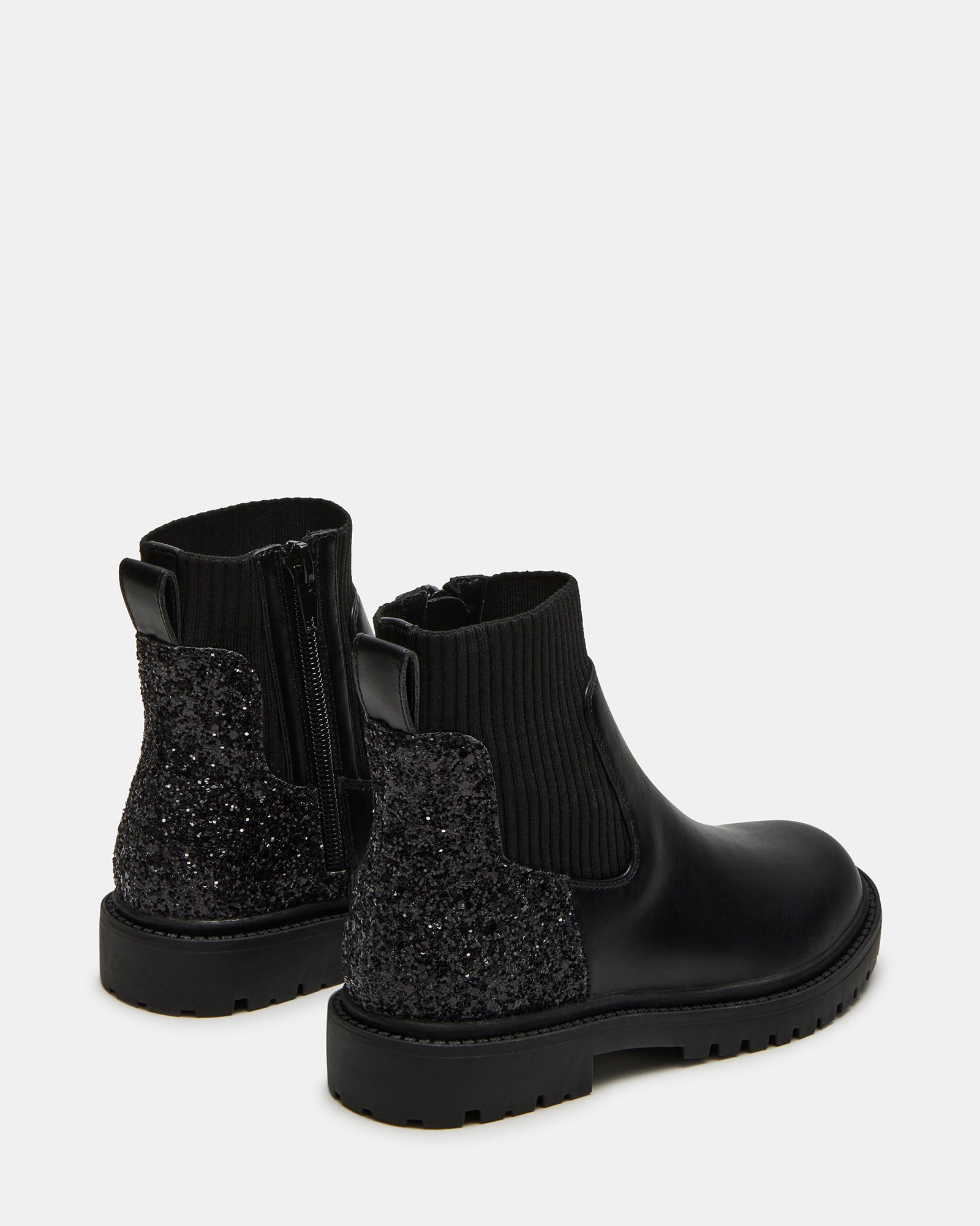 Close-up of the glitter texture and vegan leather material on the Lilyana boots.