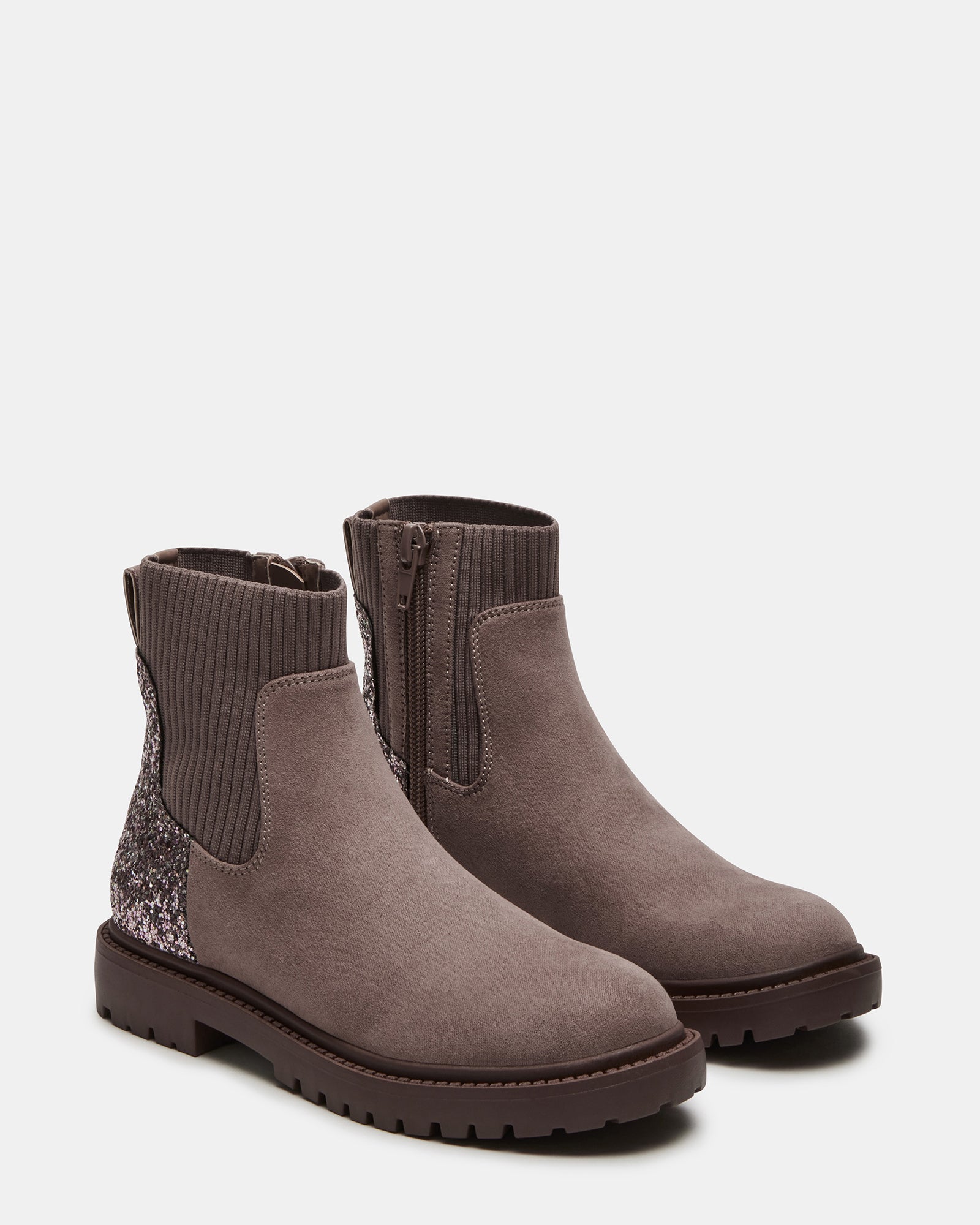 Close-up of the side zipper and textured microsuede upper.