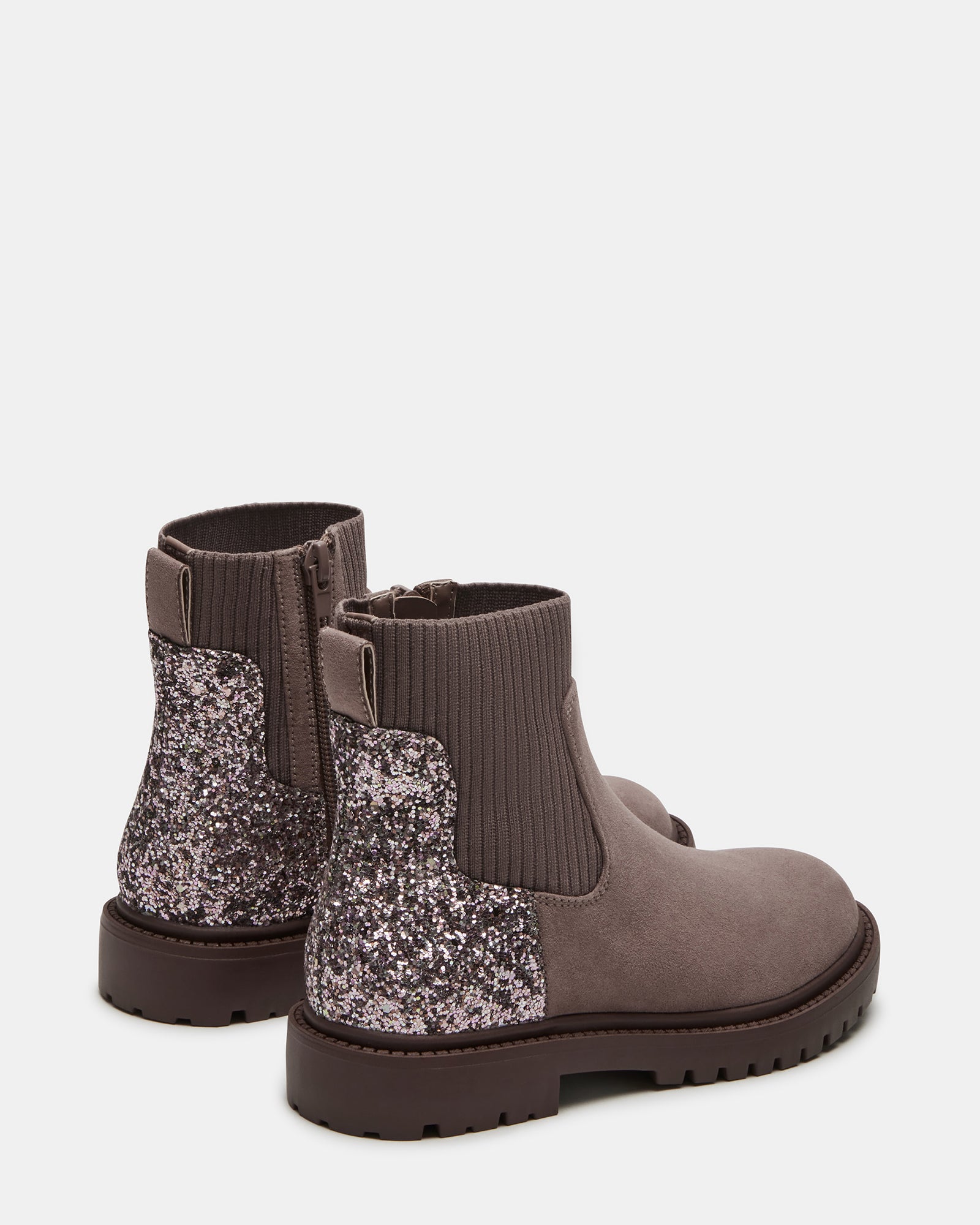 Close-up of the side zipper and textured microsuede upper.