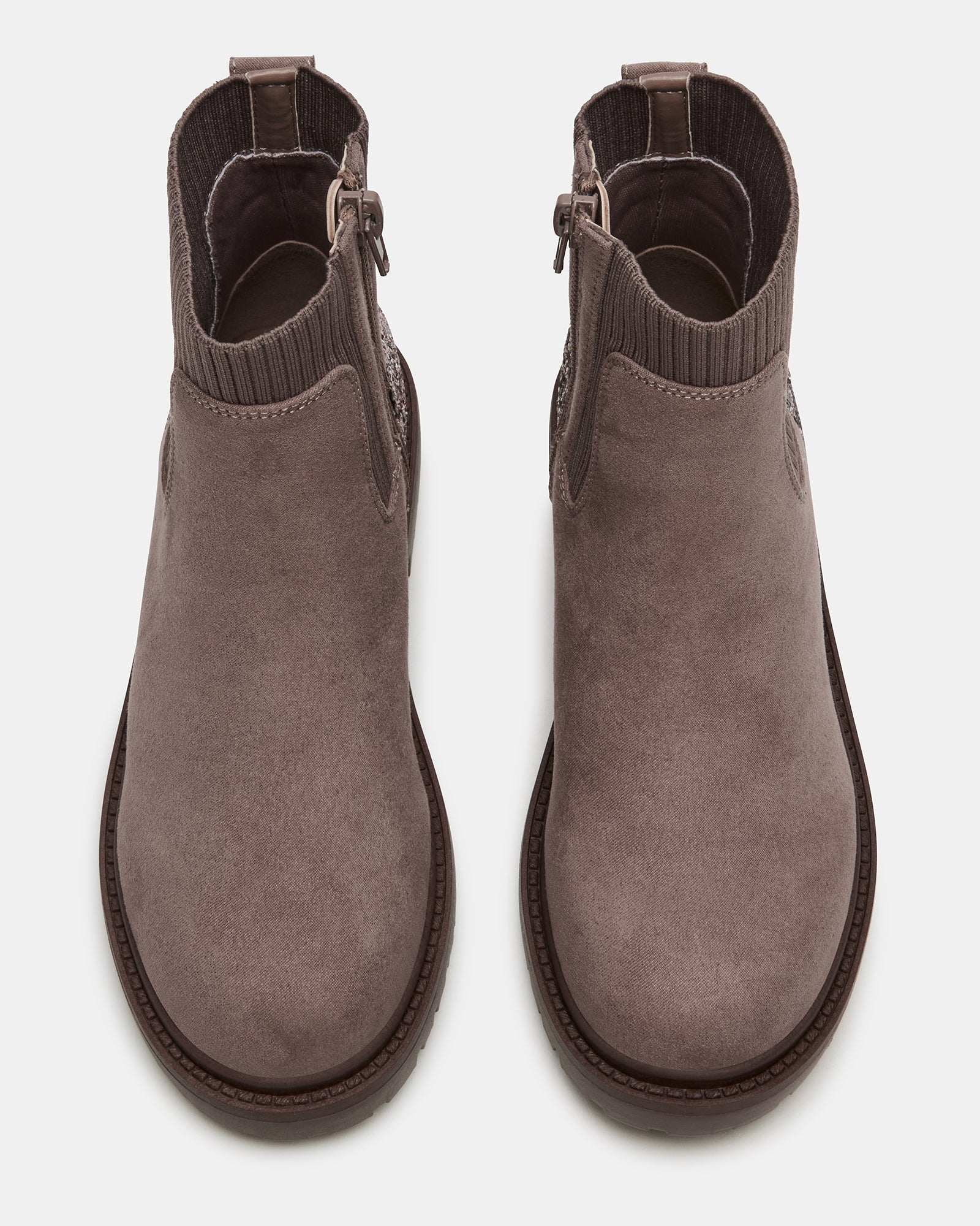 Kids Lilyana ankle boots with glitter detail, paired with jeans.