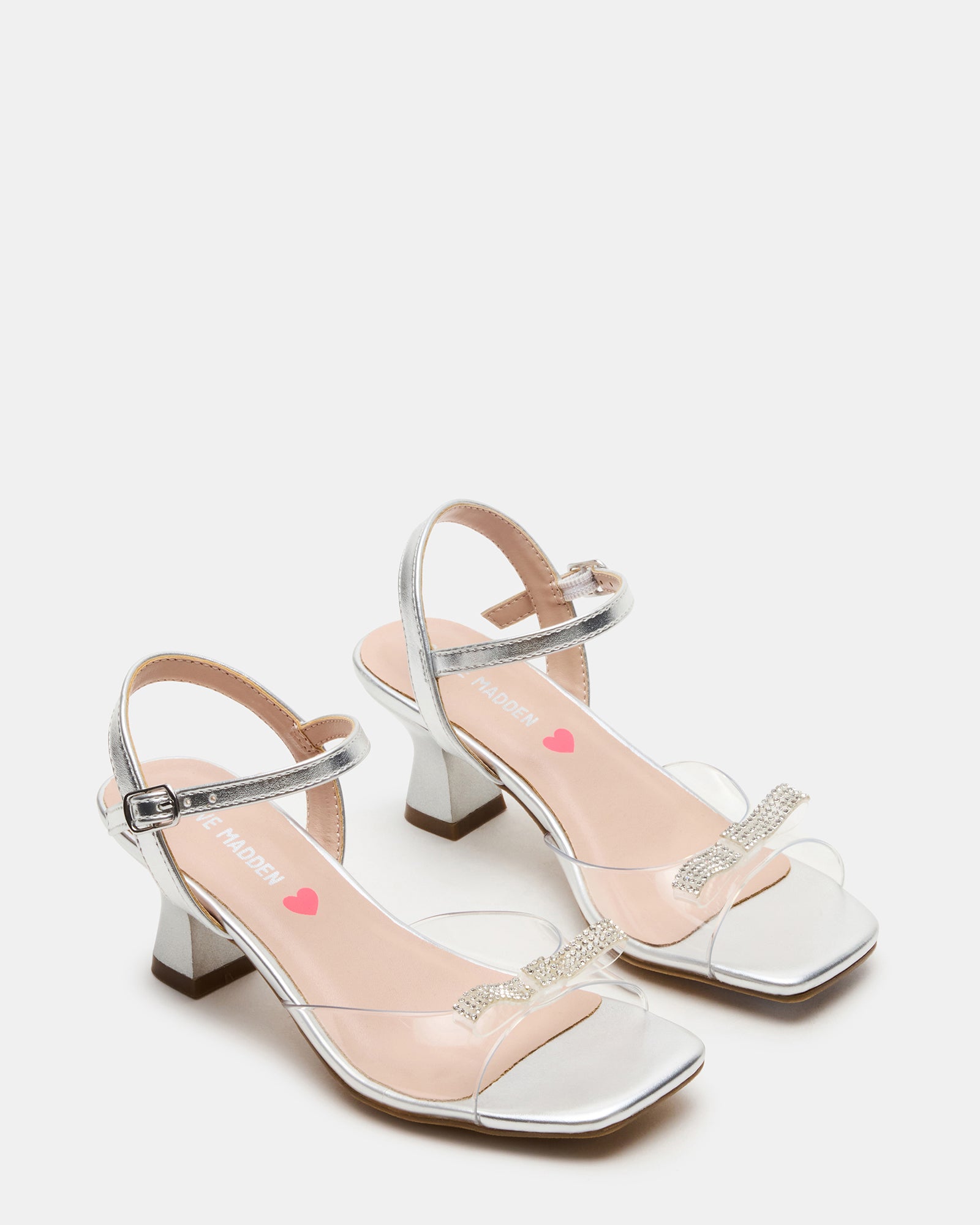 Side view of fashionable kids shoes with secure ankle strap